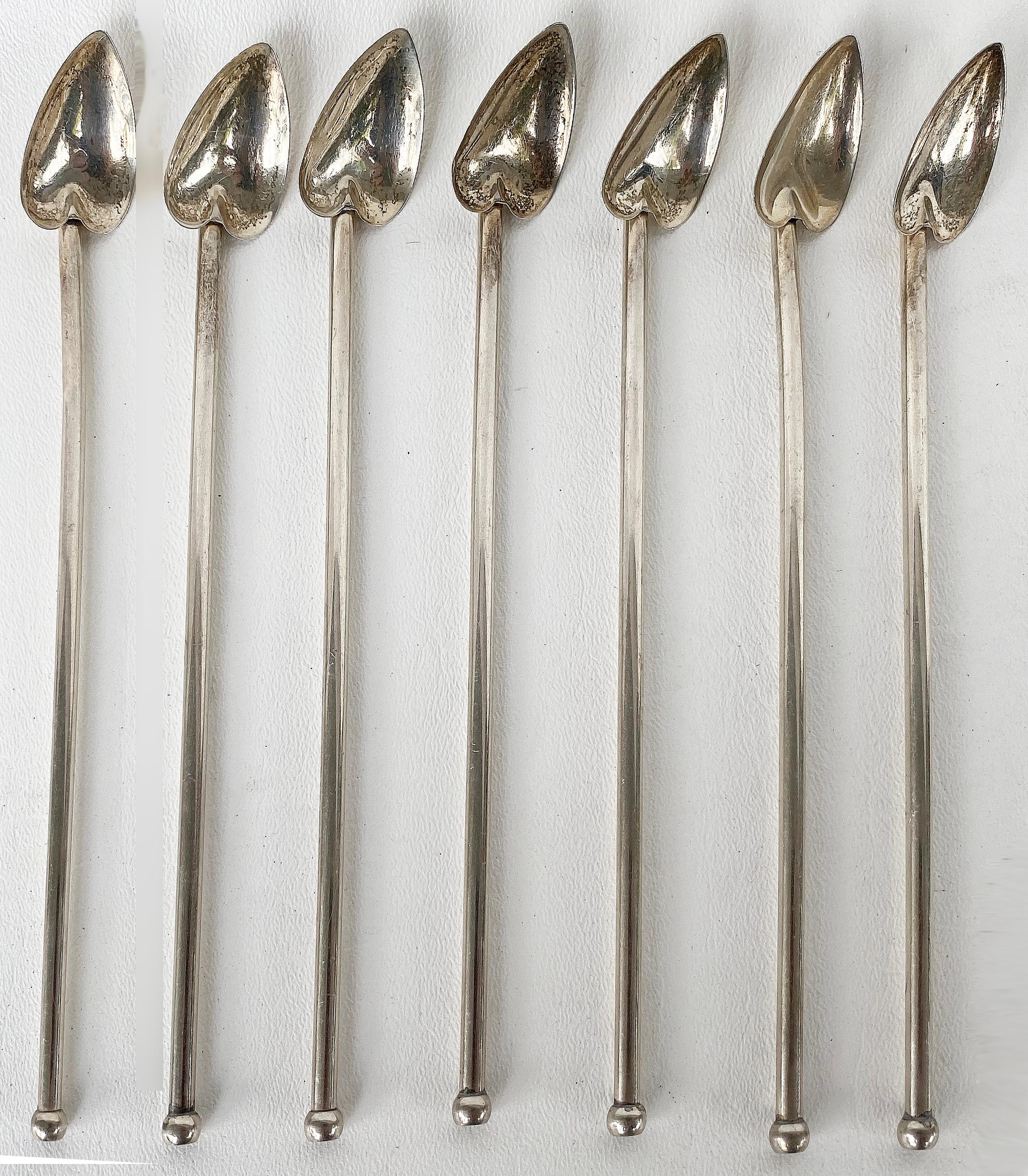 Sterling silver heart-shaped tea spoon straws, set of 12, Italian 

Offered for sale is a set of 12 sterling silver heart-shaped drinks straws. The set includes 5 slightly longer straws and 7 slightly shorter ones. They are a combination of two