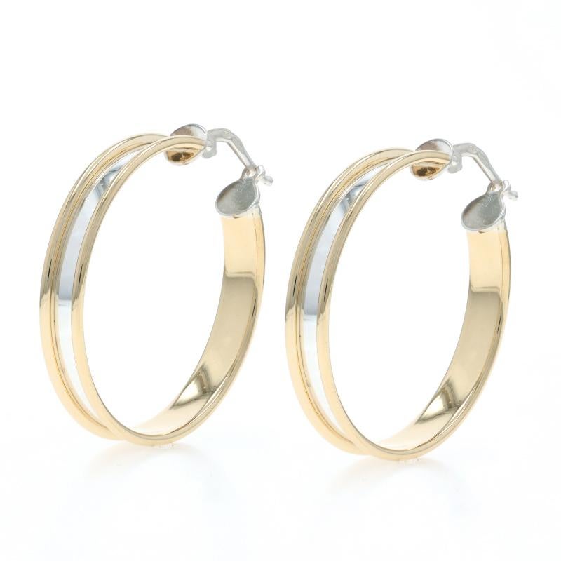 Metal Content: Sterling Silver 
18k Yellow Gold

Style: Hoop
Fastening Type: Snap Closures

Measurements

Tall: 1 3/8