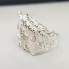 Sterling Silver Horse Ring with a Ruby Eye and Diamonds on the Strap