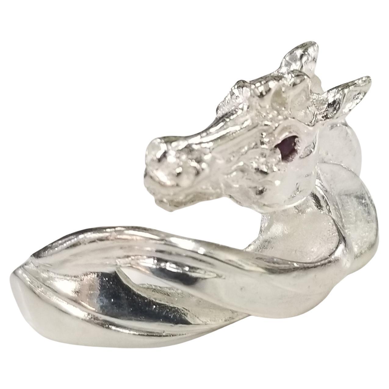 Sterling Silver Horse Ring with a Ruby Eye, Containing 1 Round Ruby Weighing .04 For Sale