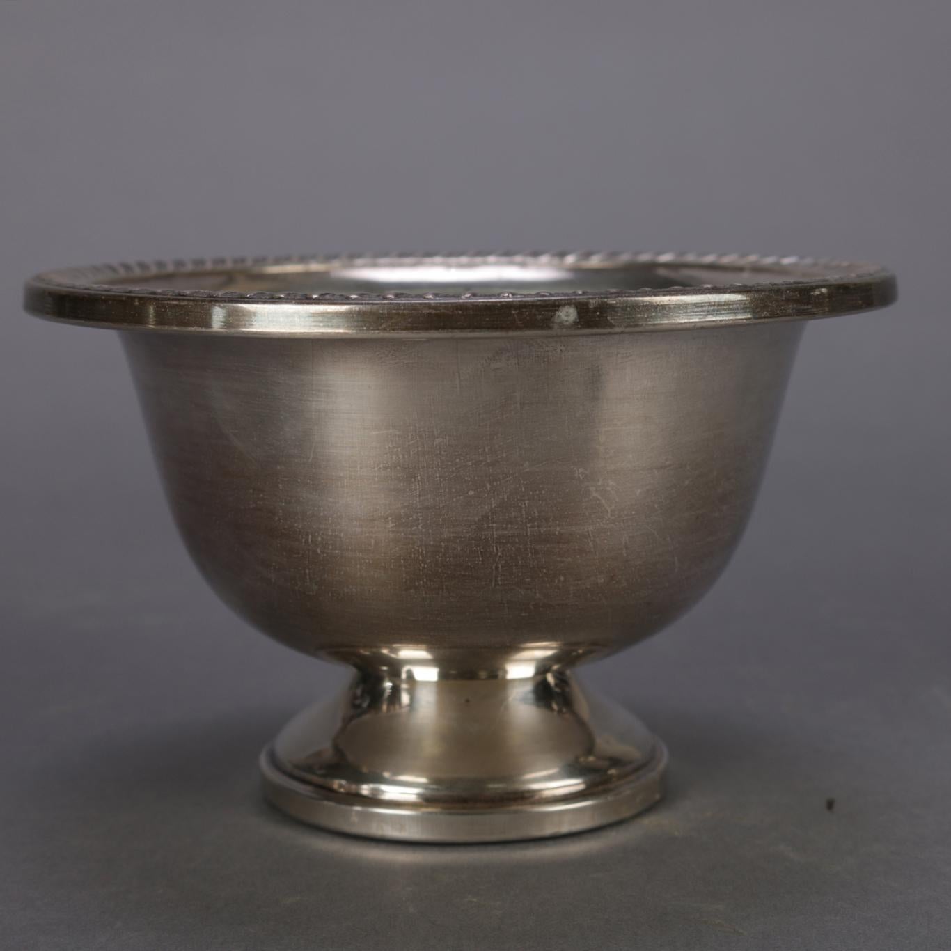 Sterling silver spun and weighted holloware compote by Hunt Silver Company features simple form with decorated rim, marked on base as photographed, 20th century.


Measures: 3.25