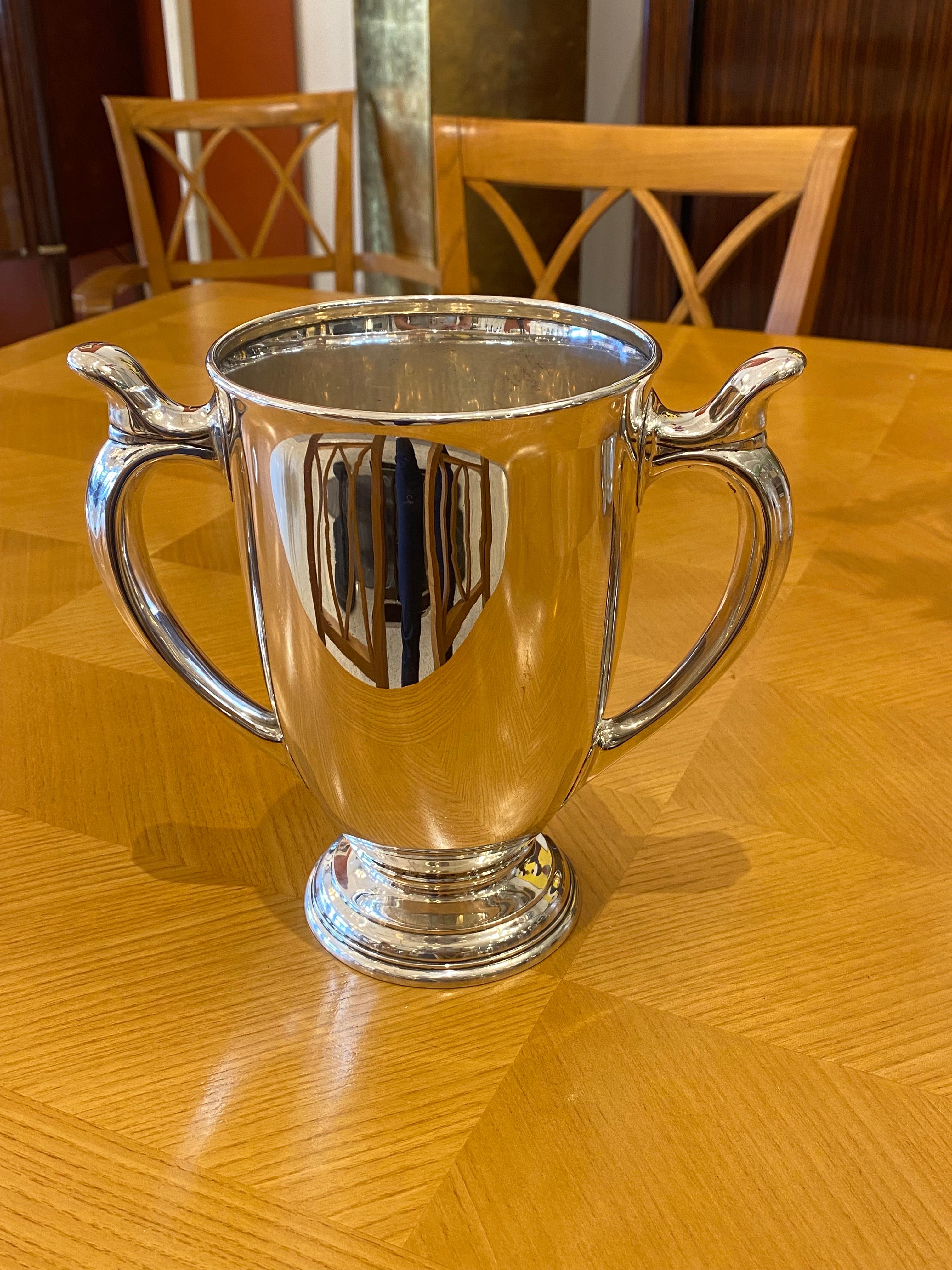 A vintage Sterling Silver ice bucket. Sealed and Numbered by Tiffany & Co.
Made in the USA.