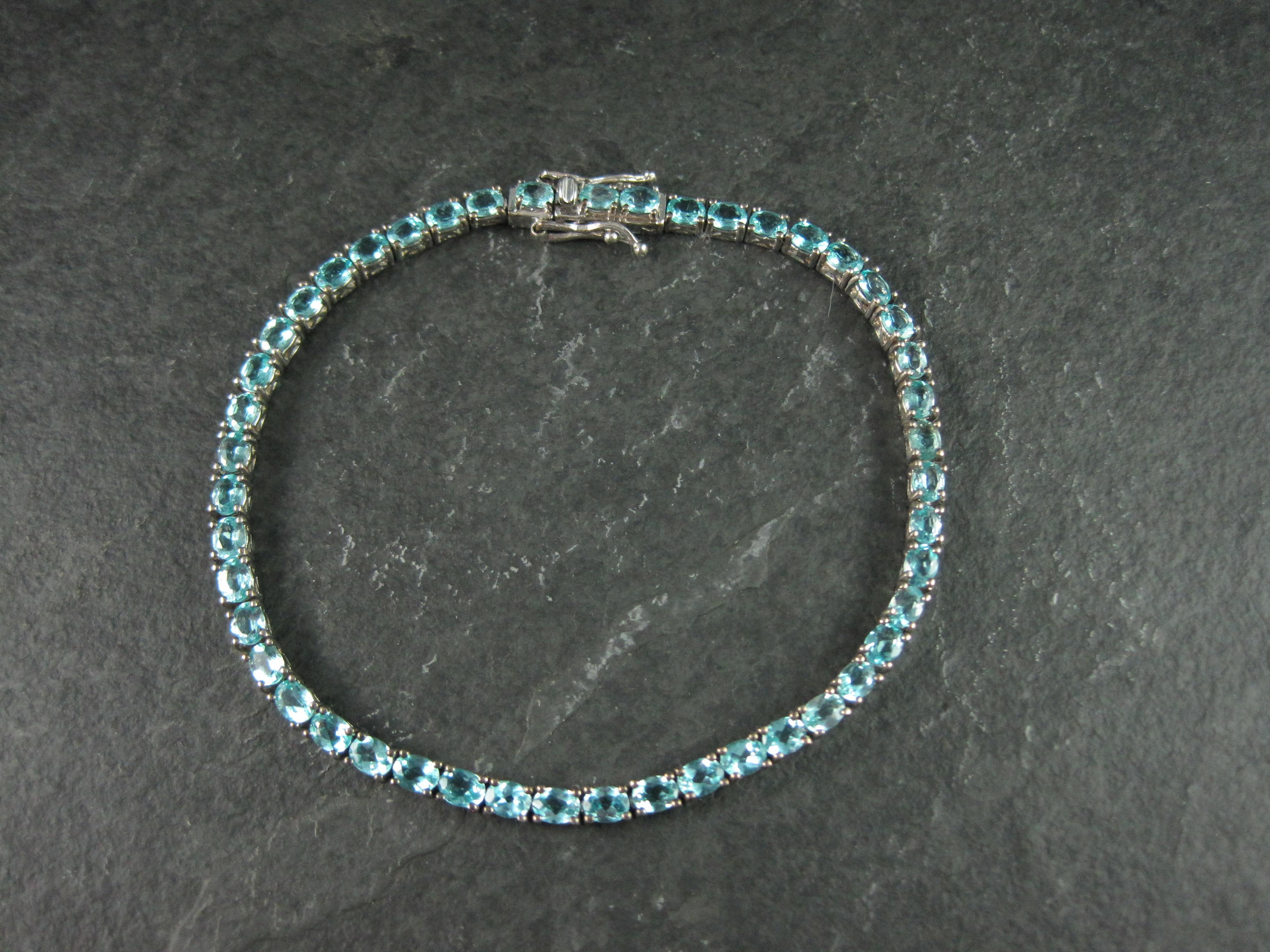 Pulsera de tenis de turmalina azul helada de plata de ley 8 pulgadas Corte oval en venta