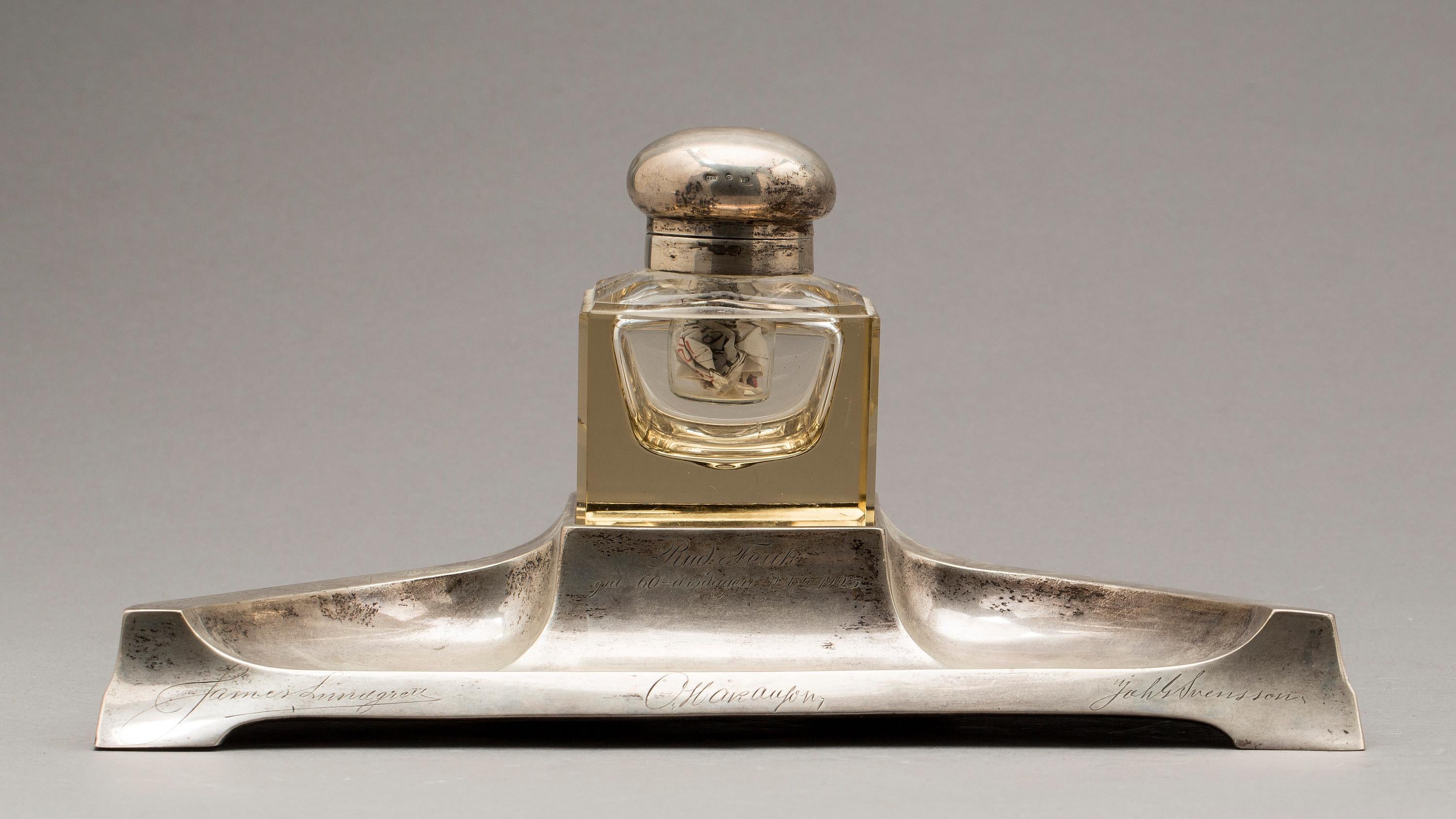 Sterling silver inkwell made in Denmark, 1920.
Very large size silver inkwell holder made of sterling silver, weight 620 grams.
Good condition, some engraving on the silver as seen on photos.
