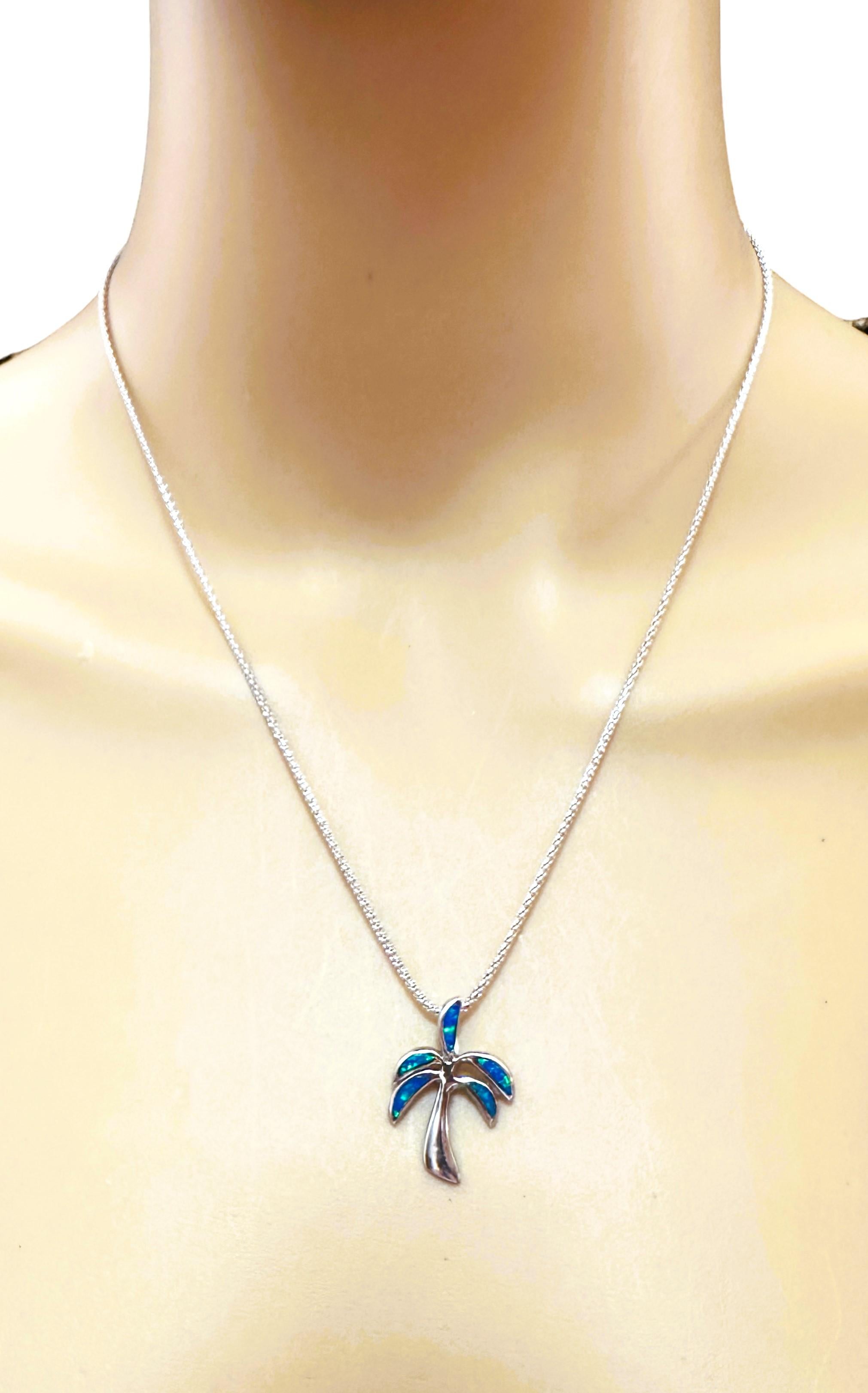 This is just a great pendant.  Makes you think of the summertime and the beach.  This necklace is pre-owned but in beautiful condition.  The Sterling Silver Chain is 18