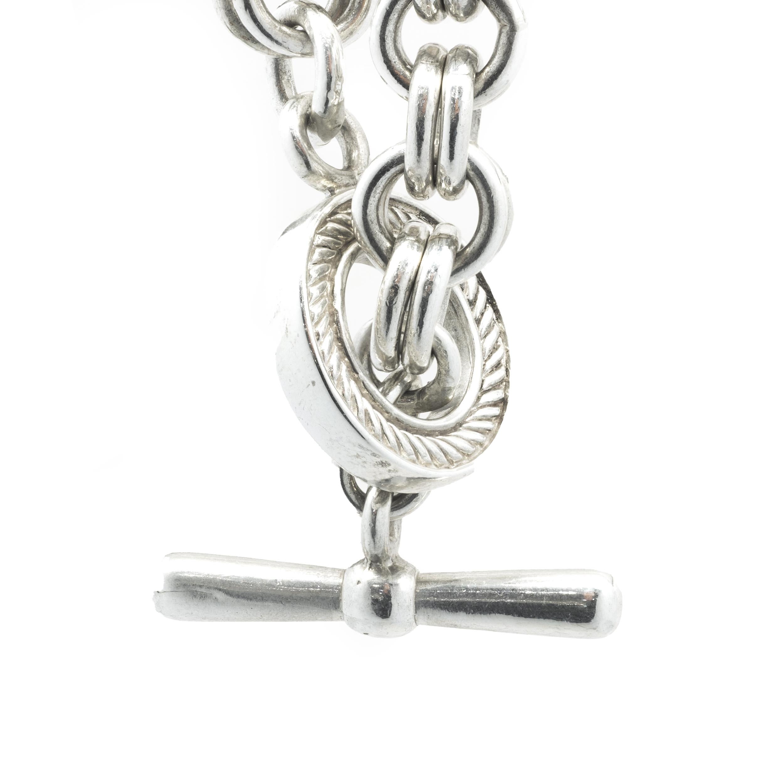 Designer: custom
Material: sterling silver
Dimensions: bracelet measures 9-inches in length
Weight: 77.13 grams
