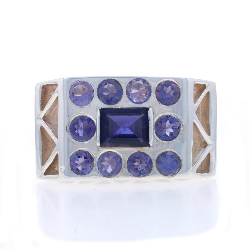 Size: 7 3/4
Sizing Fee: Up 1 size for $30

Metal Content: Sterling Silver

Stone Information
Natural Iolites
Cut: Emerald & Round
Color: Purple

Style: Solitaire with Accents

Measurements
Face Height (north to south): 21/32
