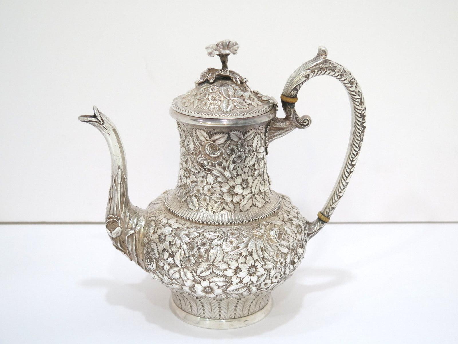 Teapot (h x l x d): 9 x 9 1/8 x 5.75 in

Sugar Bowl (h x l x d): 5 1/8 x 7.25 x 5 in

Creamer (h x l x d): 4 5/8 x 5.5 x 3 7/8 in

Total Weight: 55.5 toz

There is a monogram on the bottom.