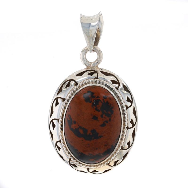 Metal Content: Sterling Silver

Stone Information
Natural Jasper
Cut: Oval Cabochon
Color: Reddish Brown & Black

Style: Solitaire
Features: Rope & Open Cut Border Detailing

Measurements
Tall (from stationary bail): 1 21/32