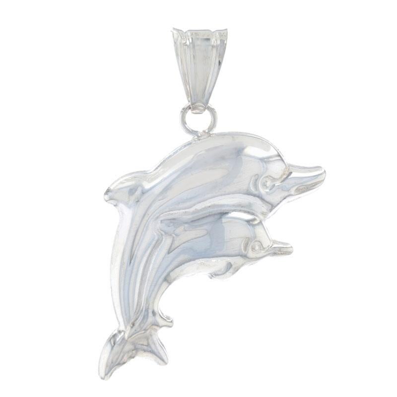 Metal Content: Sterling Silver

Theme: Jumping Dolphins, Mama Cow & Baby Calf
Features: Hollow Construction for Comfortable, All-Day Wear

Measurements
Tall (from stationary bail): 1 7/16