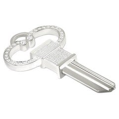 Used Sterling Silver Key with white sapphire pave is custom made to fit your lock!