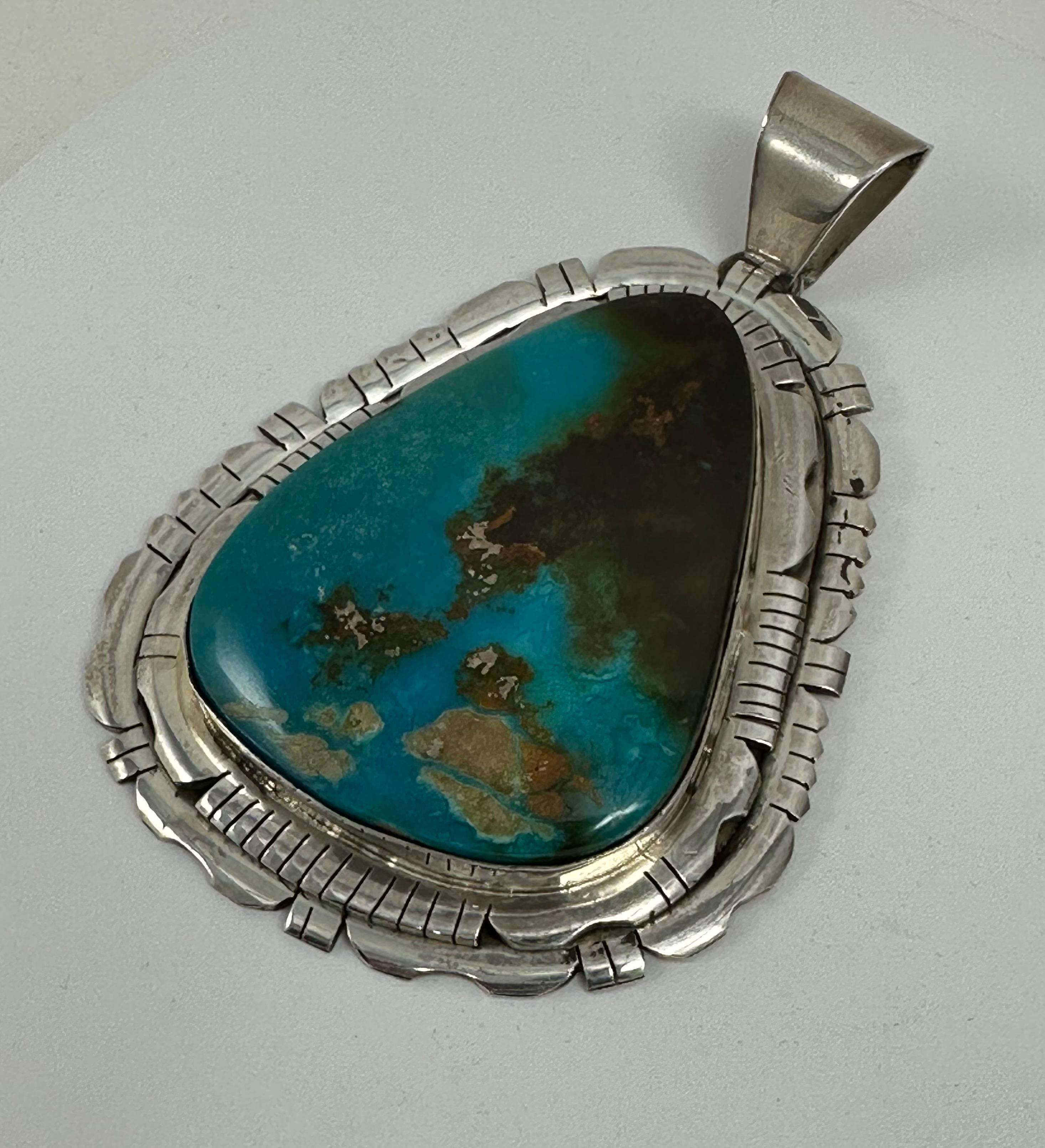 Sterling Silver Navajo Turquoise Pendant By Navajo Artist Allison Johnson 
Measures approximately 2.25