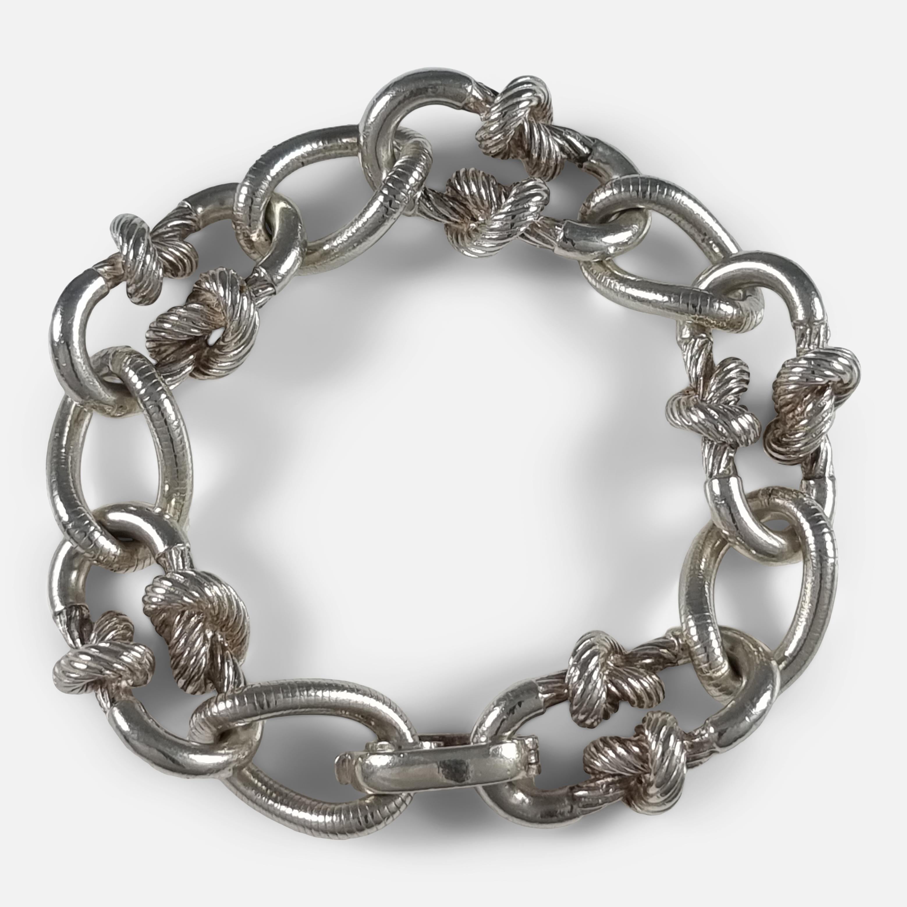 A German sterling silver knot link bracelet, by Grossé.

The bracelet is stamped with the makers mark 'Grosse', 'Germany', '1970', and 'S925'.

Stamped with London import marks, 1971.

Assay: - .925 (Sterling silver).

Period: - Late 20th