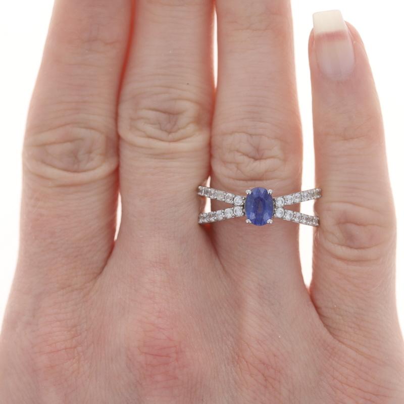 Sterling Silver Kyanite & White Topaz Ring 925 Oval Cut

Stone Information:
Natural Kyanite
Cut: Oval
Color: Blue

Natural White Topaz
Cut: Round

Additional Information:
Material: Metal Sterling Silver

Style: Solitaire with Accents
Features: Split