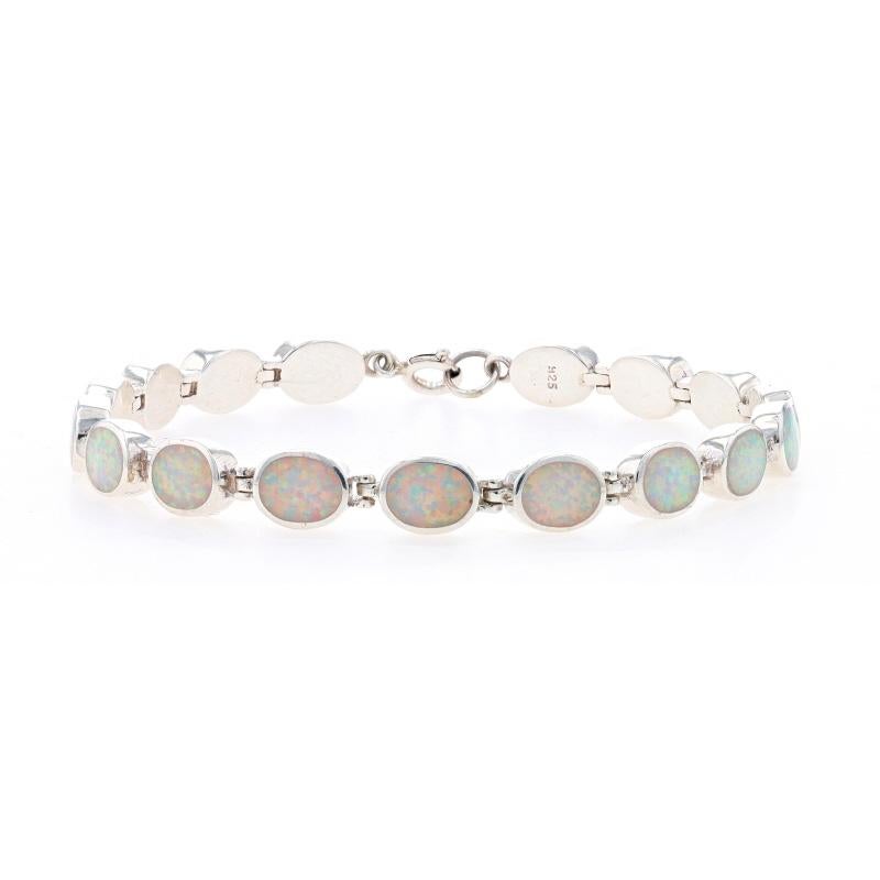 Metal Content: Sterling Silver

Stone Information
Synthetic Opals
Cut: Inlay

Style: Link
Fastening Type: Spring Ring Clasp

Measurements
Length: 7 1/2