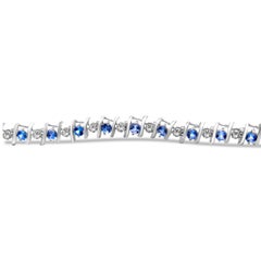 Sterling Silver Lab-Grown Gemstone and 1/6 Carat Round Diamond Tennis Bracelet