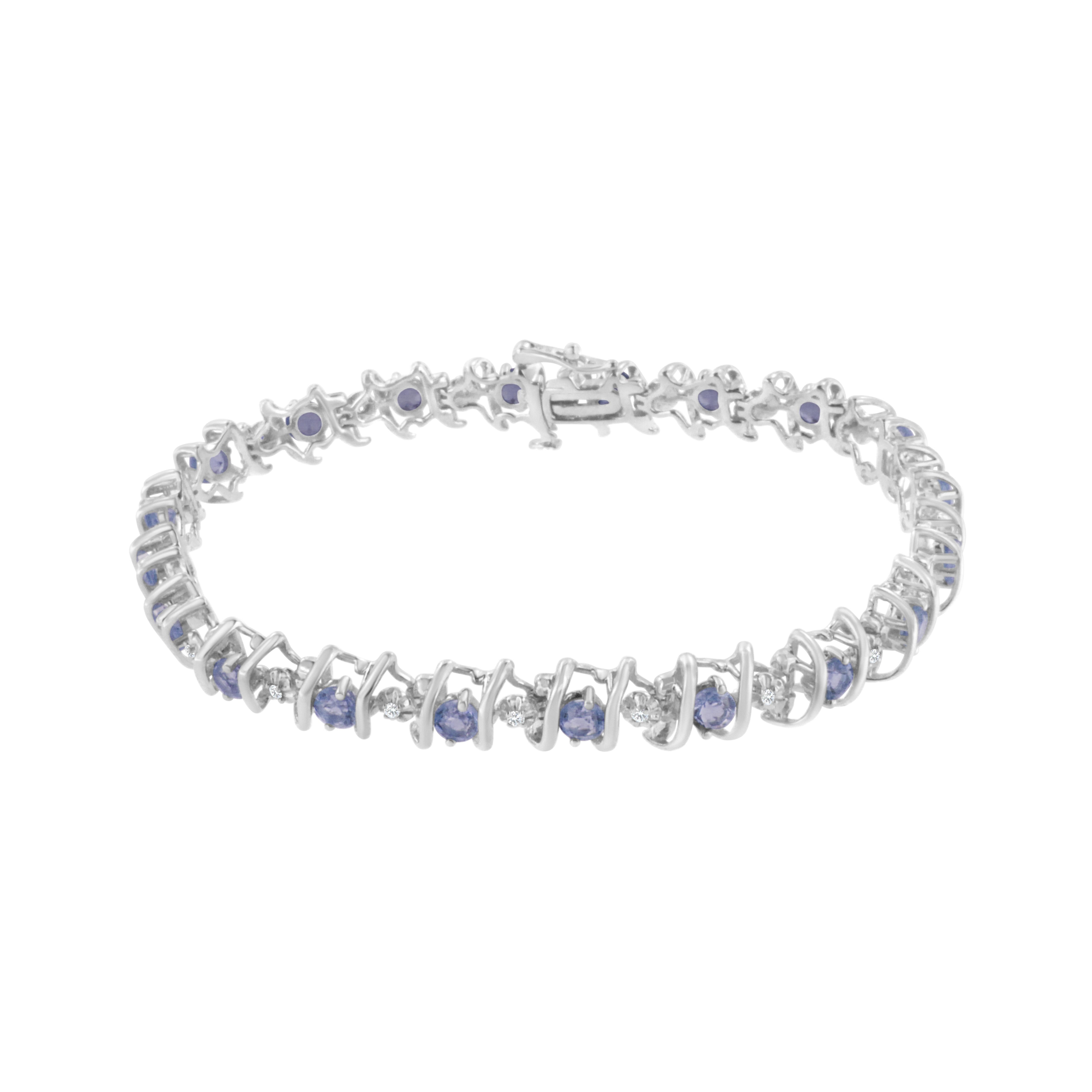Vivid created birthstones and sparkling white diamonds are set in this S-link tennis bracelet crafted in cool .925 sterling silver. The bracelet features 20 sparkling diamonds set in miracle-plate settings that multiply their sparkle, for a total