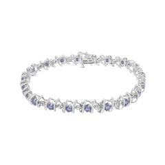 Sterling Silver Lab-Grown Gemstone and 1/6 Carat Round Diamond Tennis Bracelet