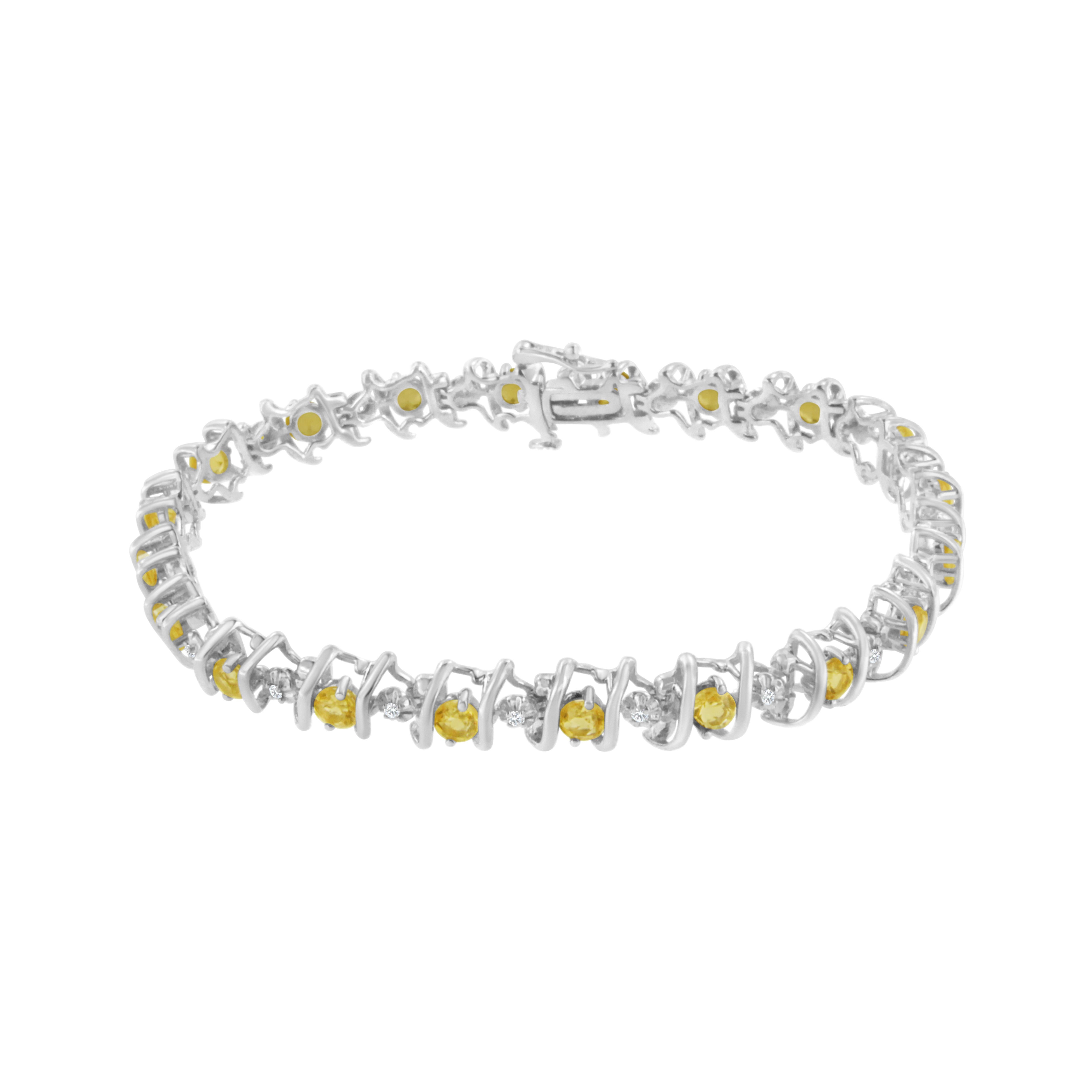 Vivid created birthstones and sparkling white diamonds are set in this S-link tennis bracelet crafted in cool .925 sterling silver. The bracelet features 20 sparkling diamonds set in miracle-plate settings that multiply their sparkle, for a total