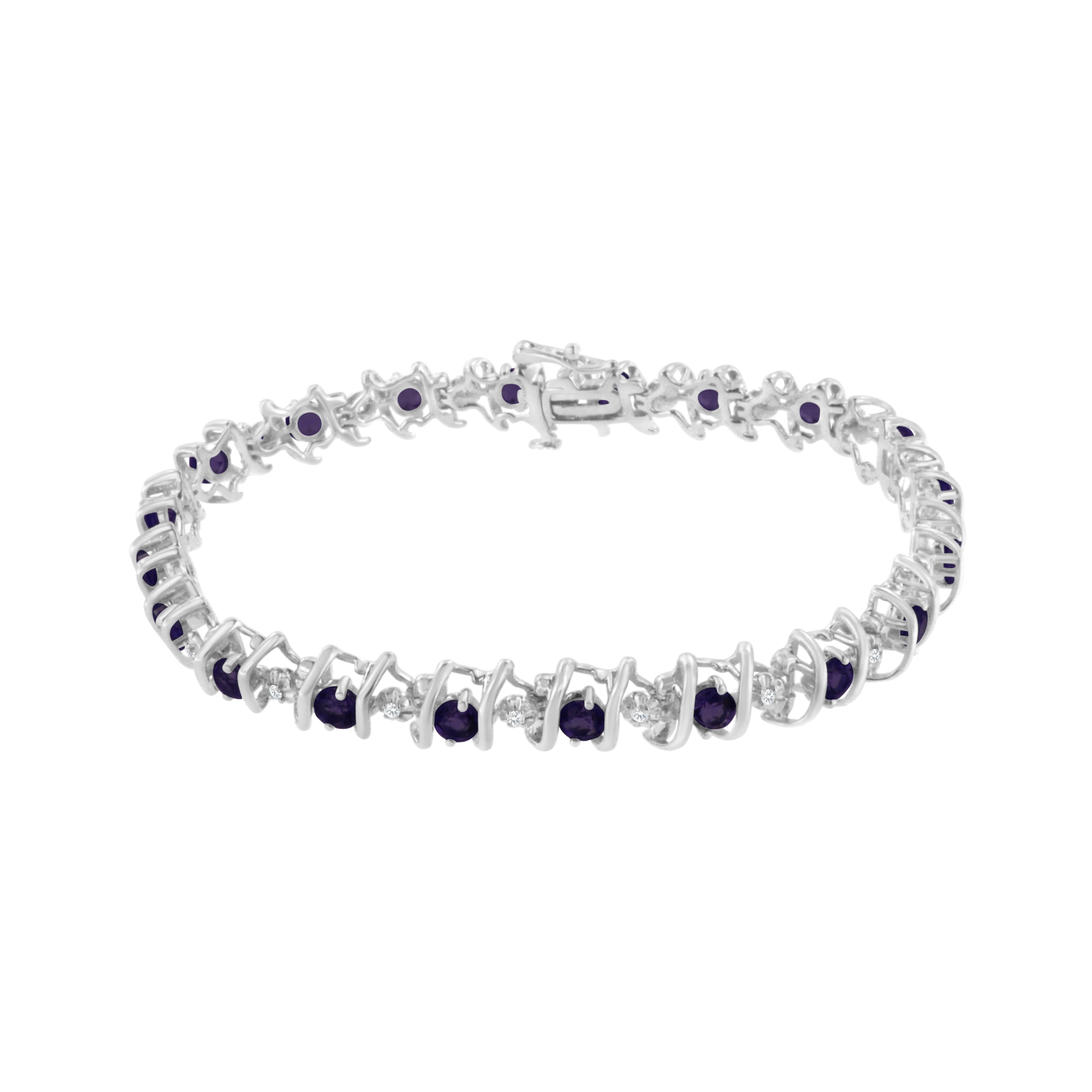 Vivid created birthstones and sparkling white diamonds are set in this S-link tennis bracelet crafted in cool .925 sterling silver. The bracelet features 20 sparkling diamonds set in miracle-plate settings that multiply their sparkle, for a total
