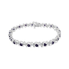 Sterling Silver Lab-Grown Gemstone and 1/6 Carat Round Diamond Tennis Bracelet