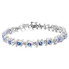 Bracelet tennis en argent sterling avec pierres précieuses de taille laboratoire et diamants ronds de 1/6 carat