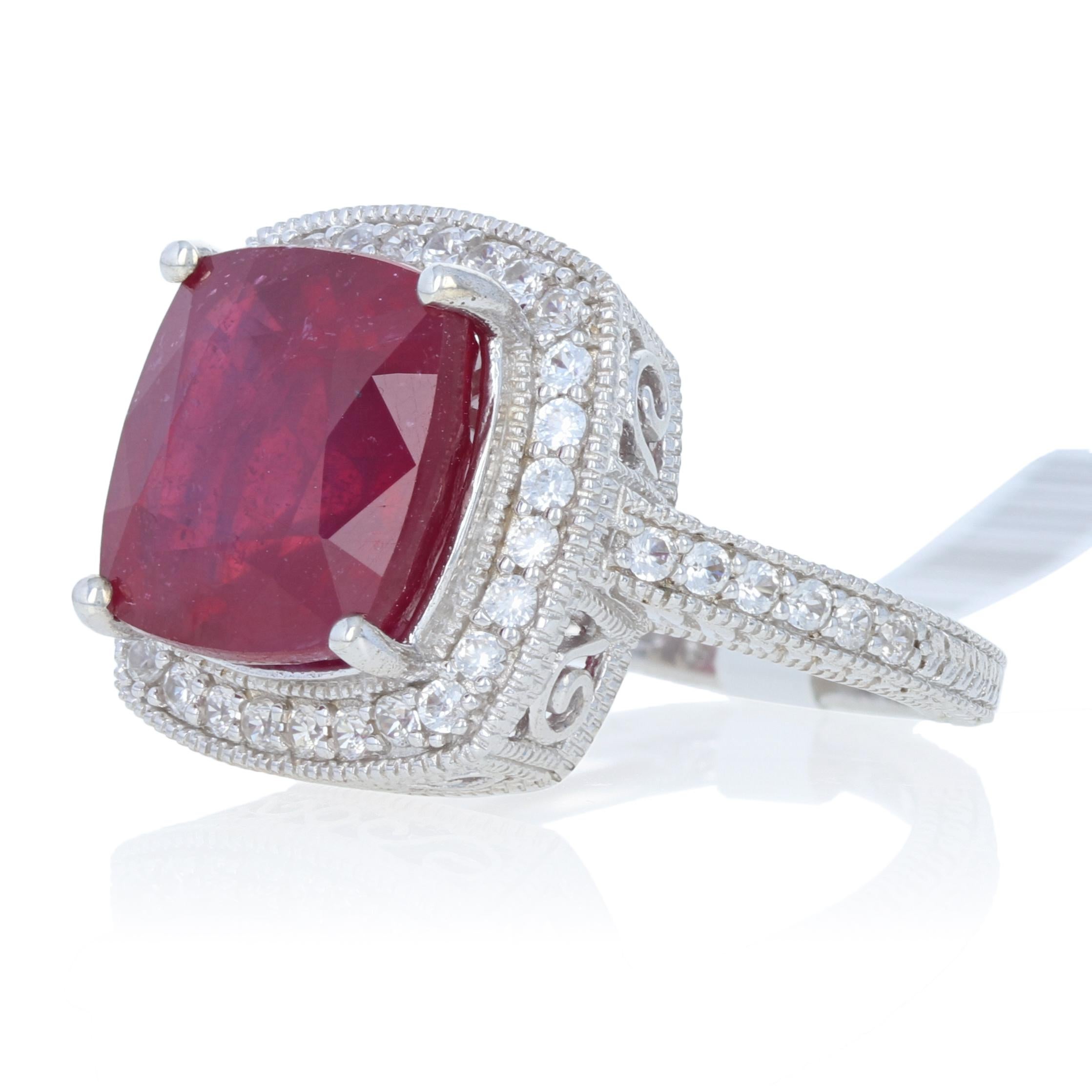 Size: 6 1/4 - 6 1/2
Sizing Fee: Up 1 size for $20

Metal Content: Guaranteed Sterling Silver as stamped

Stone Information: 
Genuine Ruby
Treatments: Heated & Lead Glass Filled
Color: Red
Size: 12.1mm Square
Carat(s): 9.50ct

Genuine Zircons
Color: