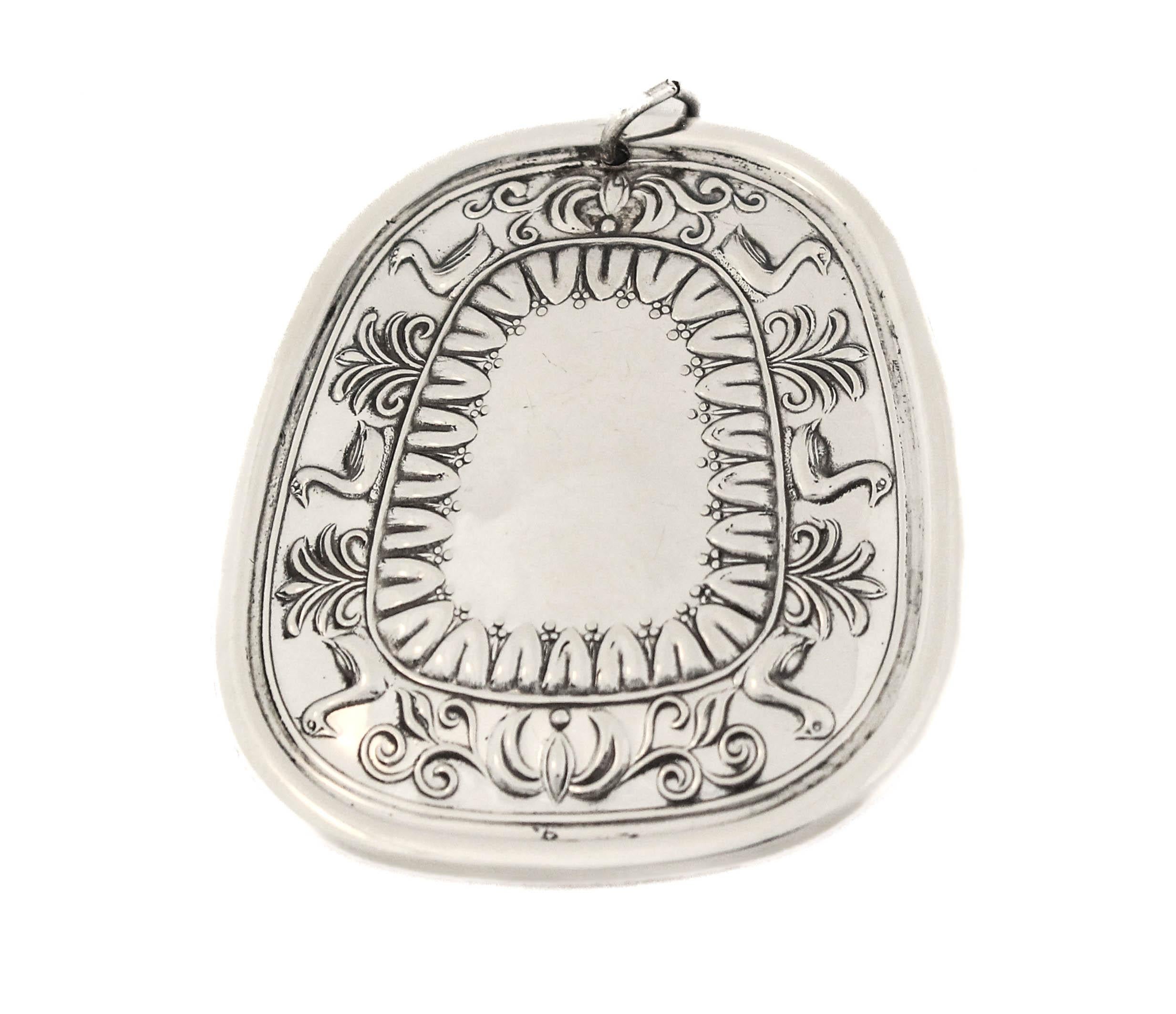 Being offered is a sterling silver Christmas ornament by Towle Silversmiths dated 1976.  In honor of the 200th anniversary of the December of Independence, this signed and limited piece was made in honor of that special occasion.  On one side is the