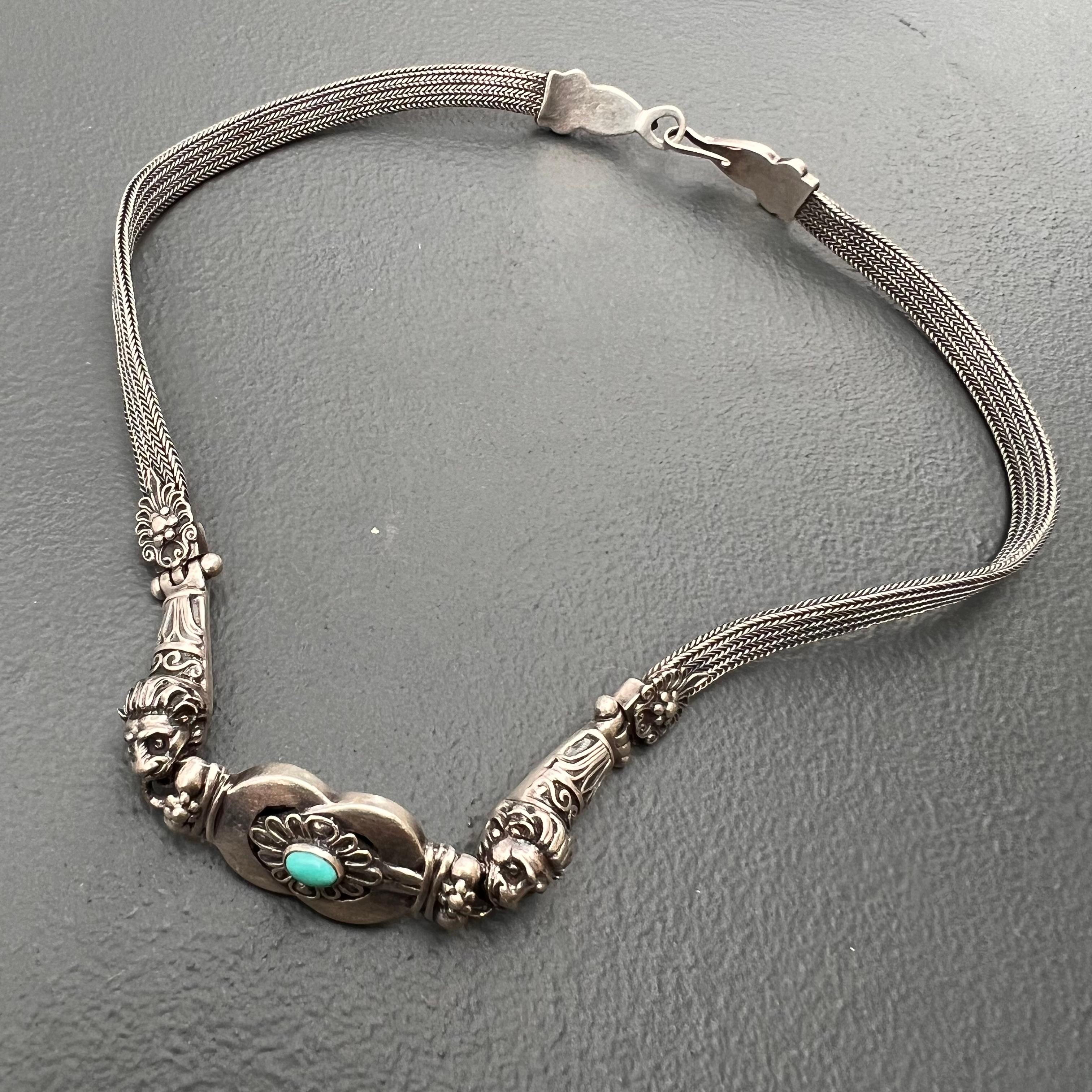 Fabulous  well made  sterling silver  choker necklace featuring  detailed lion heads on each sides of central pendant  flexible wide woven chain with ornate clasp on backside ( 
