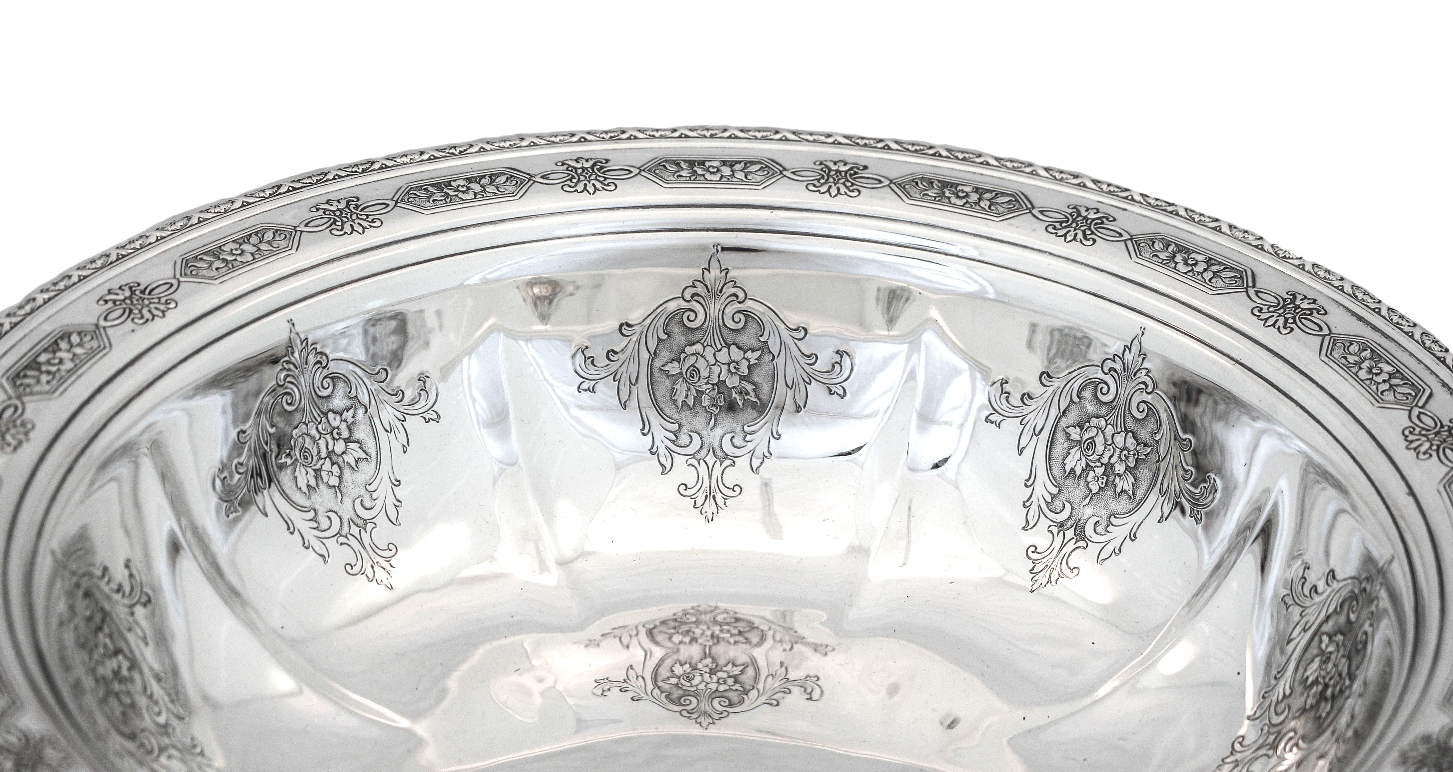Being offered is a sterling silver bowl in the “Louis XIV” pattern by Towle Silversmiths. It has old-world charm and elegance. Around the border there is a symmetrical design with flowers. Inside the bowl around the edge, eight floral medallions