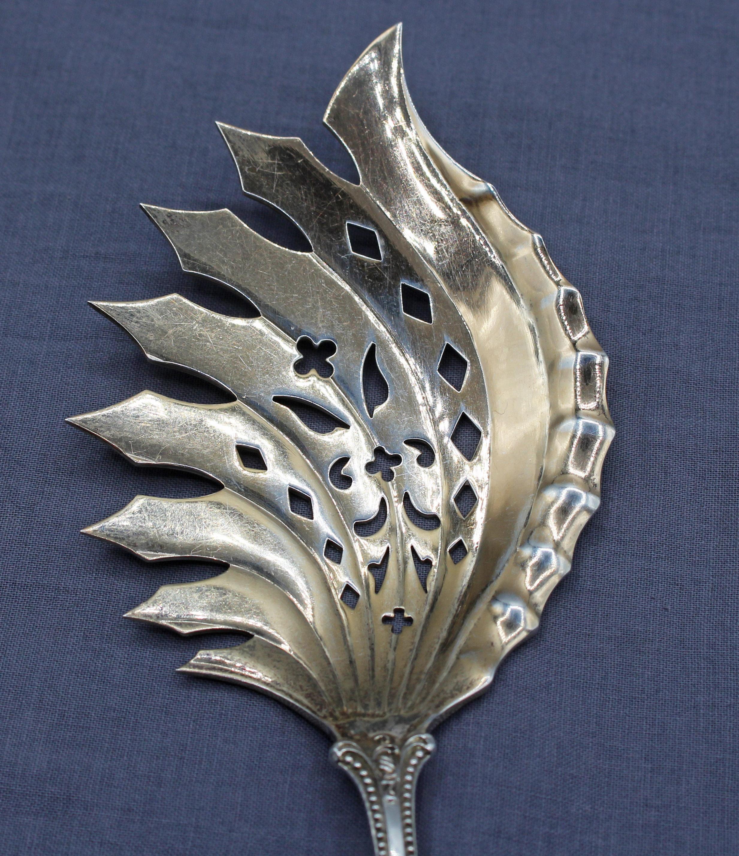 Sterling silver macaroni or pasta server by Towle, Old Colonial pattern. Gold washed serving surfaces. 1895 pattern. Monogram 