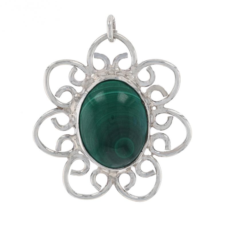Metal Content: 925 Sterling Silver

Stone Information

Natural Malachite
Cut: Oval Cabochon
Color: Green

Pendant Style: Solitaire
Theme: Flower

Measurements

Tall: 1 3/16