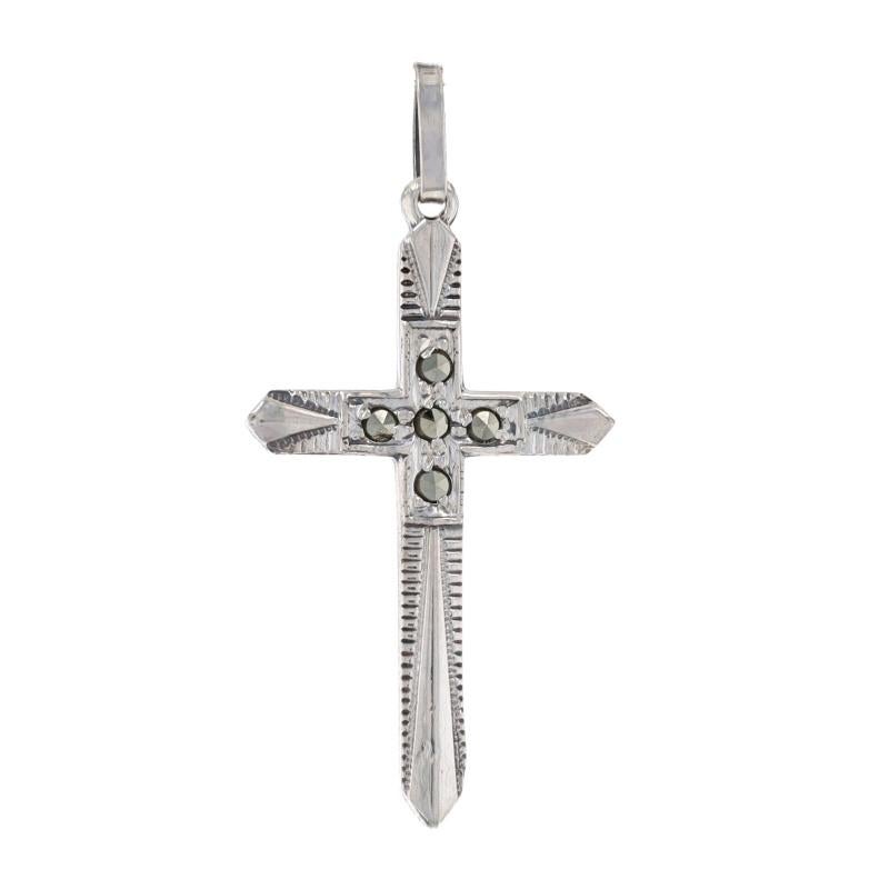 Metal Content: 925 Sterling Silver

Stone Information

Natural Marcasites
Color: Grey

Theme: Etched Cross, Faith

Measurements

Tall (from stationary bail): 1 1/8