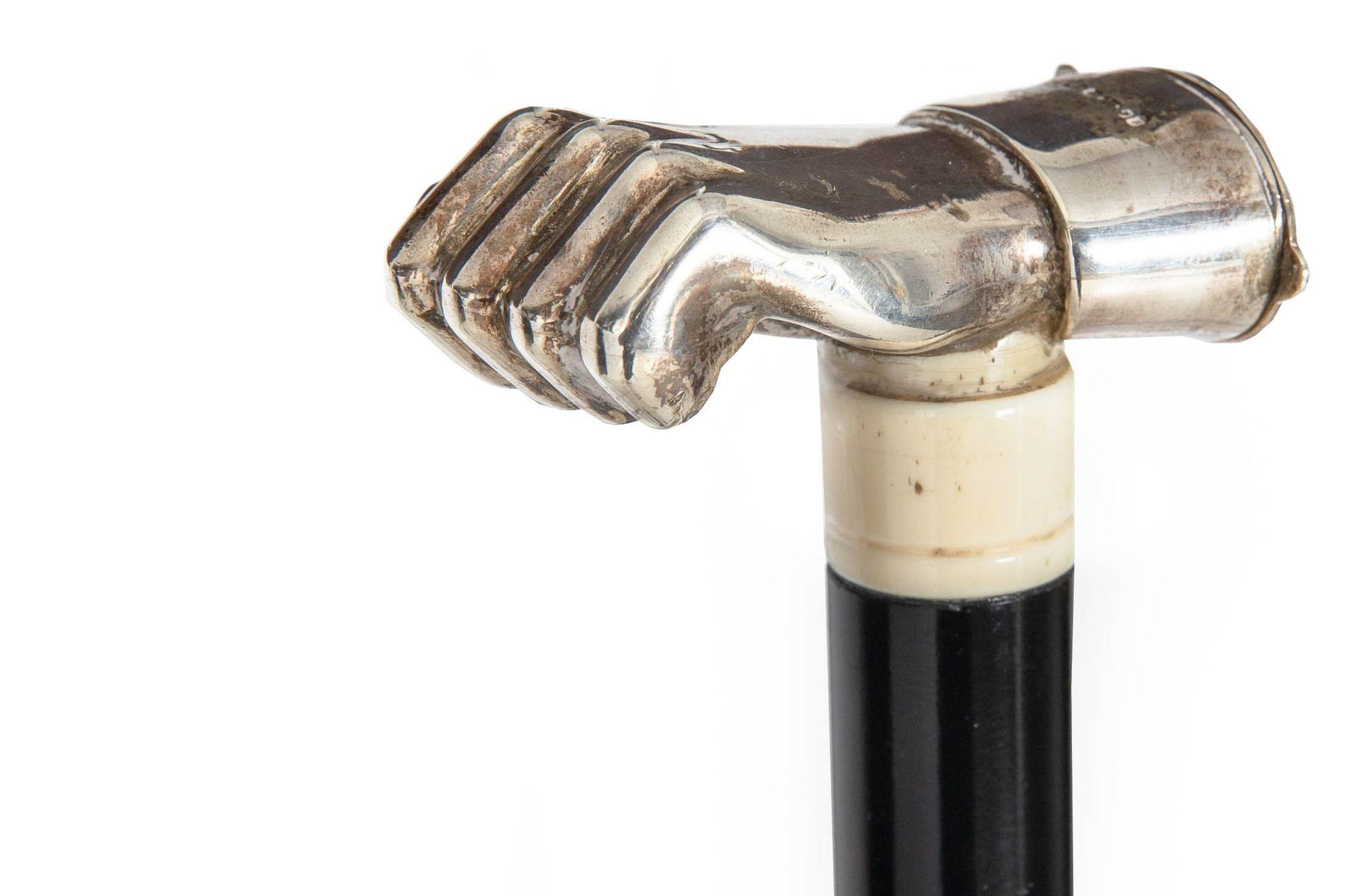 STERLING SILVER MATCH SAFE GADGET CANE
David A. Bowles, London
Circa late 20th century

35 7/8
