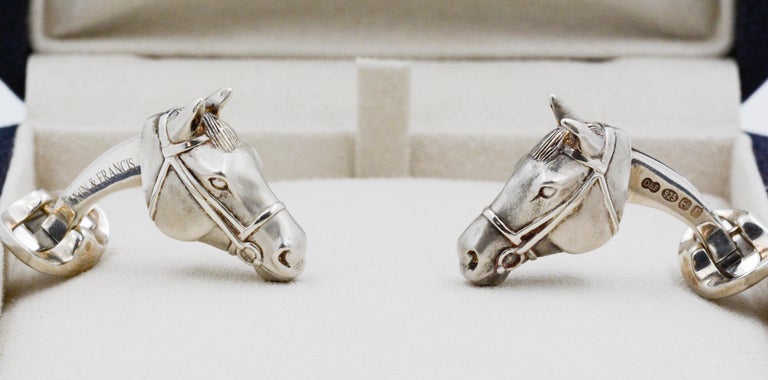 These sterling silver horse head cufflinks feature a lifelike and intricate design. The cufflinks are in a matte finish that creates an elegant and timeless look. You are able to see tiny details of the mane and reigns on the horse heads. These