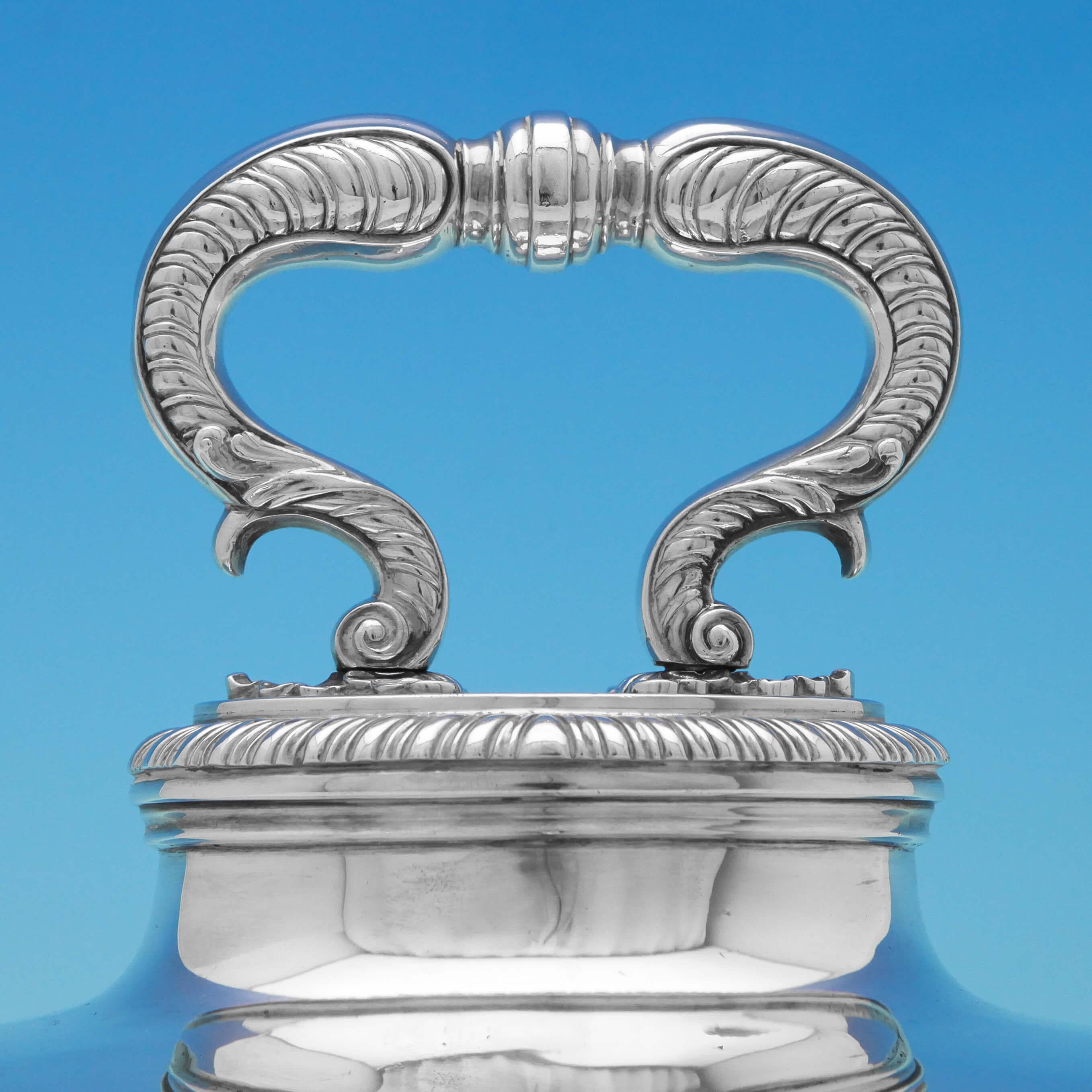 Hallmarked in London in 1807 by Paul Storr, this handsome, George III, Antique Sterling Silver Meat dish cover, features a shaped gadroon border and removable gadroon detailed handle and is engraved with the coat of arms of Weetman Dickinson