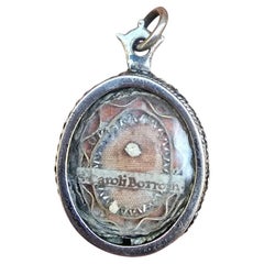 Medallón relicario de plata de ley - Siglo XVIII
