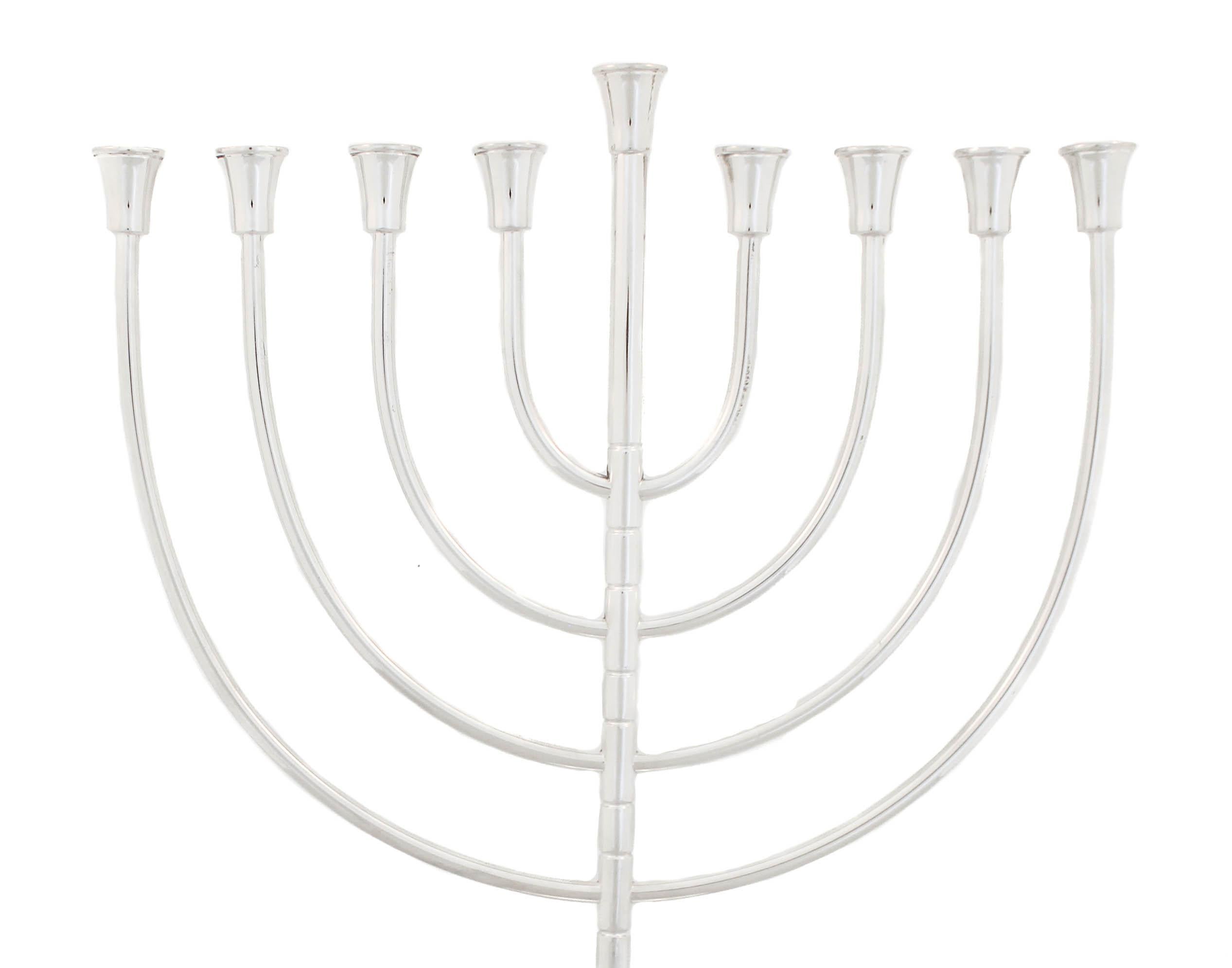 Being offered is a sterling silver menorah made in Israel.  It is modern and yet has a classic and timeless design.  Sleek and understated without any ornamentation, it brings a contemporary aesthetic to an ancient tradition.
Happy Hanukkah!