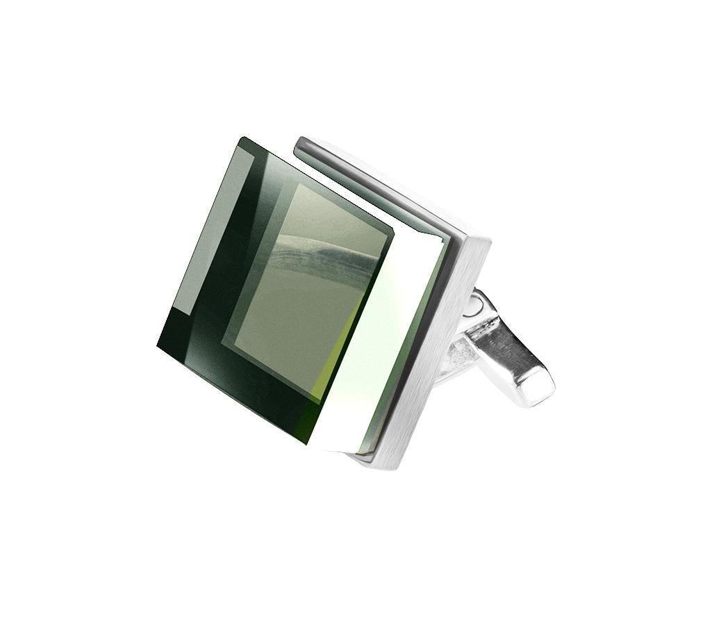 These stunning art deco style cufflinks are crafted from Sterling Silver and feature 10x10x6 mm natural green quartzes. 

The Ink collection, which includes these cufflinks, has been a favorite of fashion editors and celebrities alike and has been