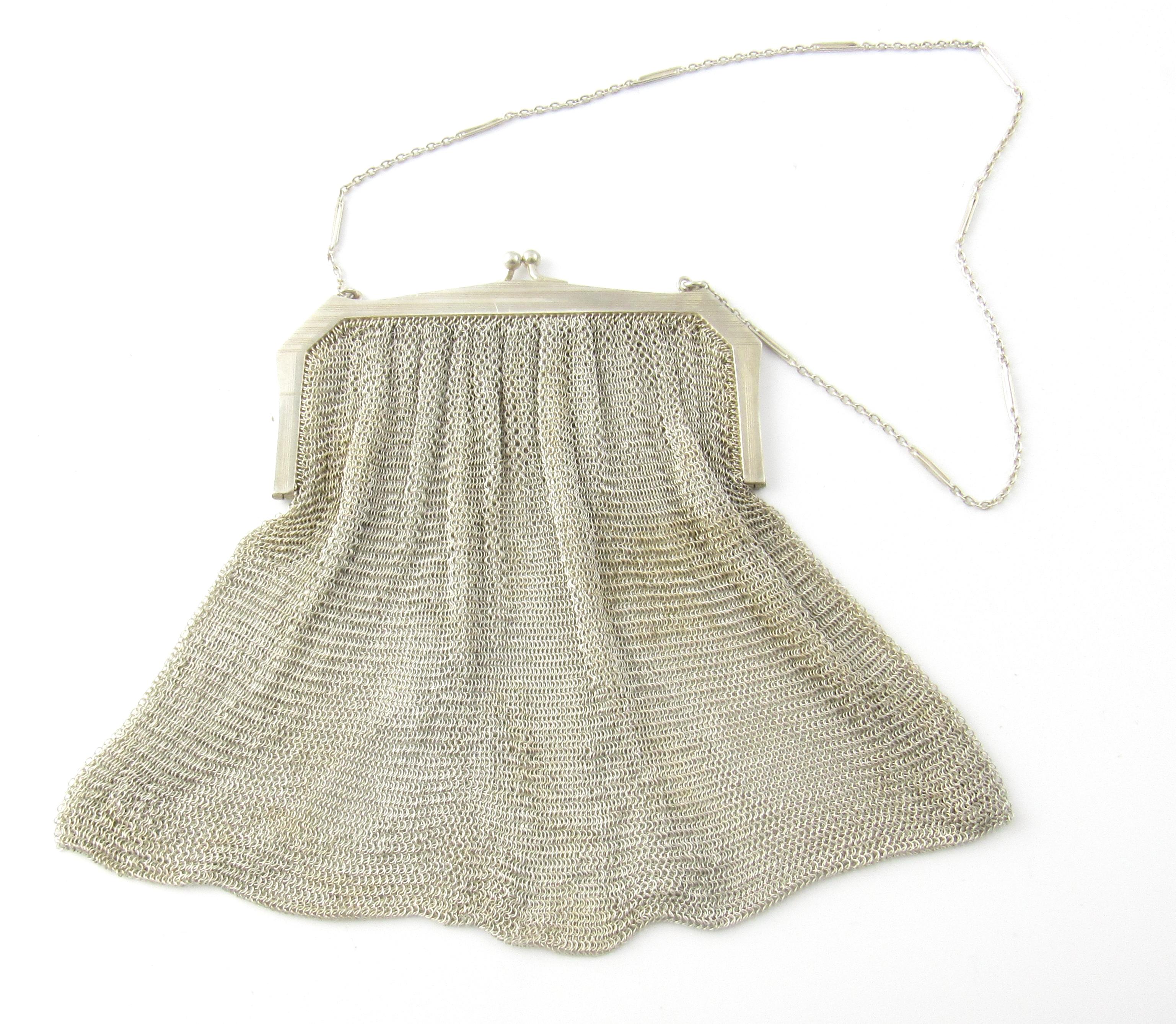 Victorian Sterling Silver Mesh Purse

This is a lovely sterling silver mesh purse with chain handle. You will simply be delighted with the condition, style, and uniqueness of this beautiful purse!

Measurement: Purse measures 5 and 1/2 inches in