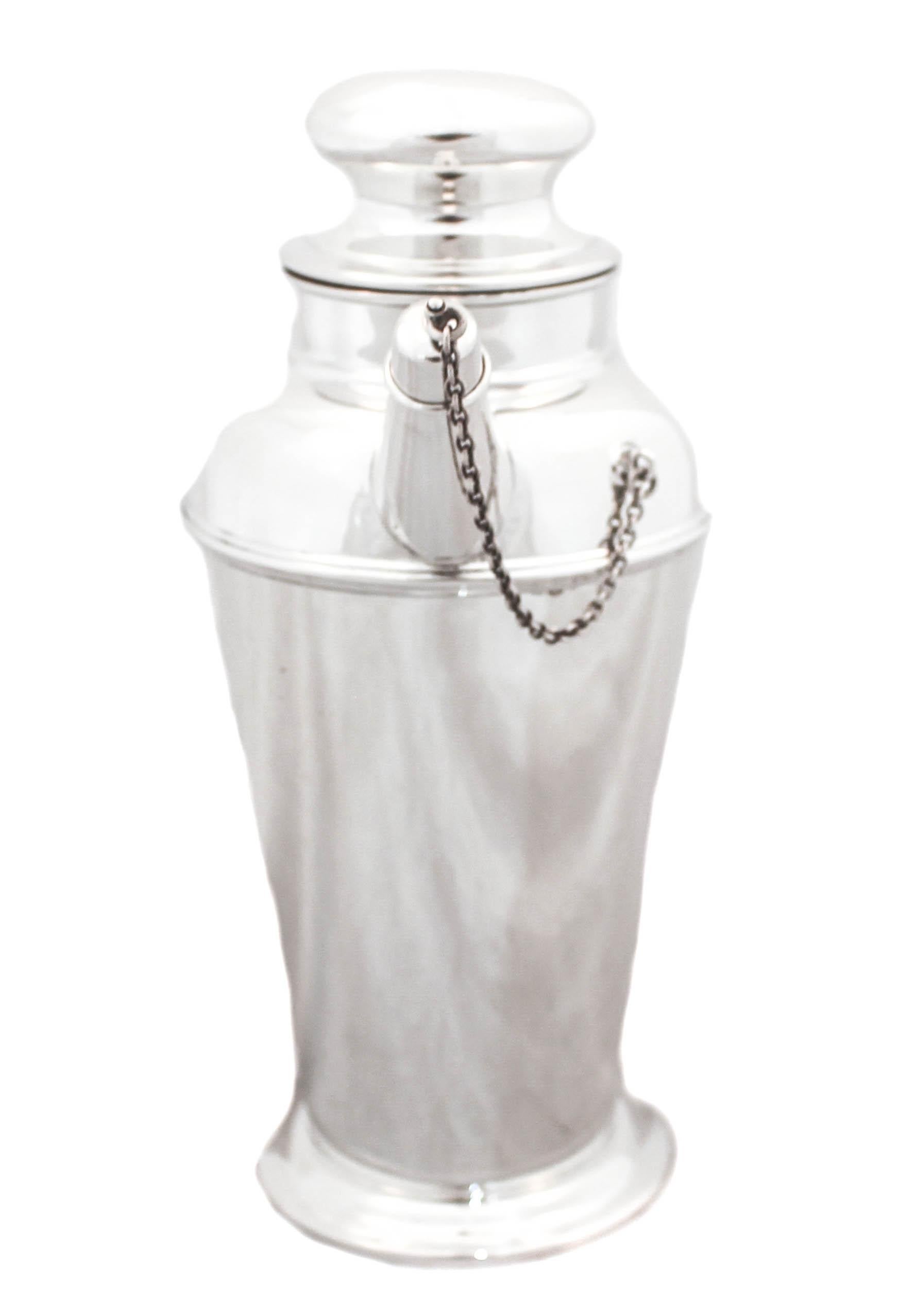 This sterling silver cocktail shaker is from the 1950’s.  Think “Breakfast at Tiffany’s” and The Rat Pack; the glamour and sleekness of that era come to life in this beautiful silver shaker. It’s in mint condition and waiting to greet your guests. 