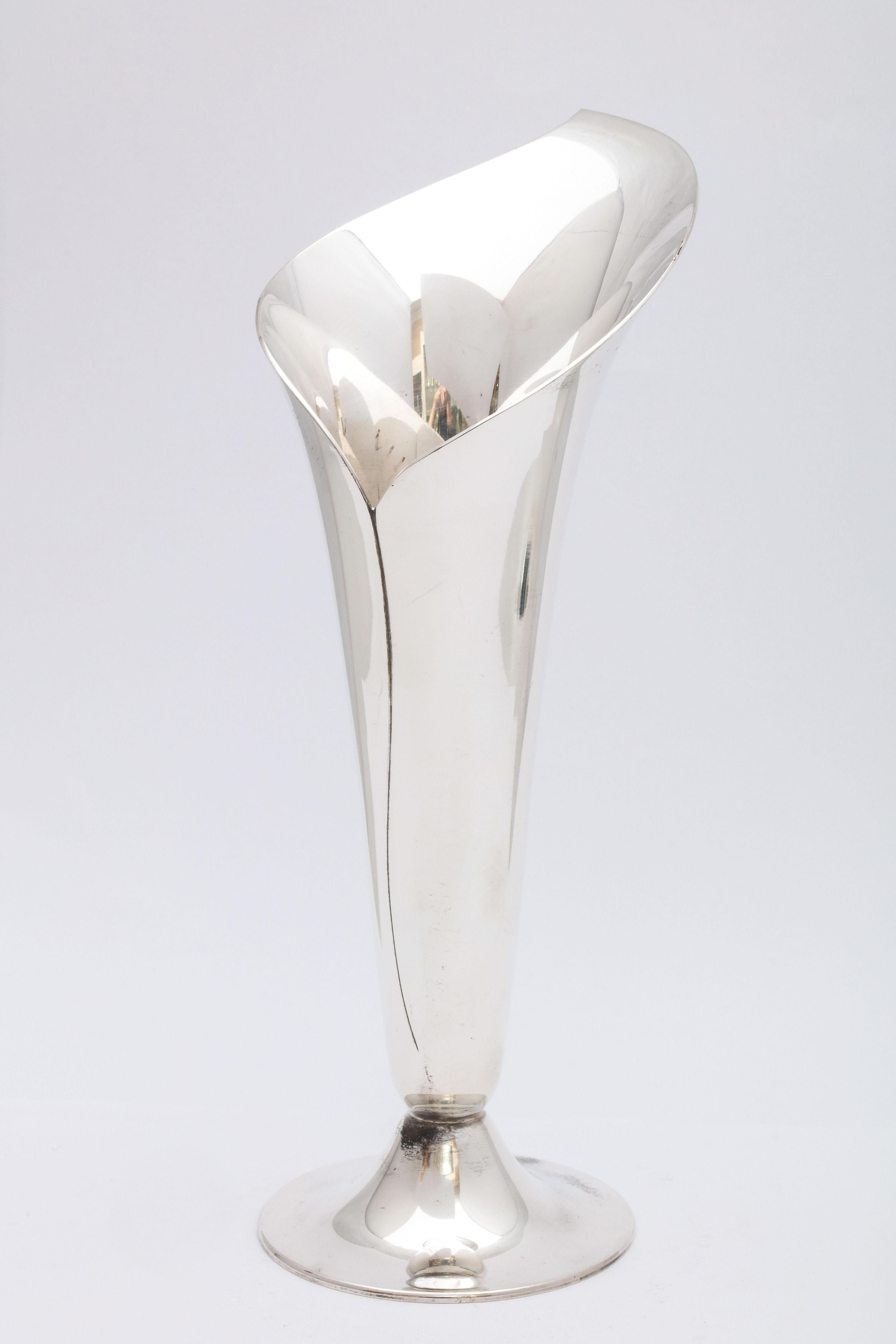 Sterling silver, Mid-Century Modern Calla Lily-form vase, Tiffany & Co., New York, circa 1950's. Measures 8 inches high (at highest point) x 3 inches in diameter across opening (widest point) x 2 3/4 inches diameter across base. Beautiful, graceful