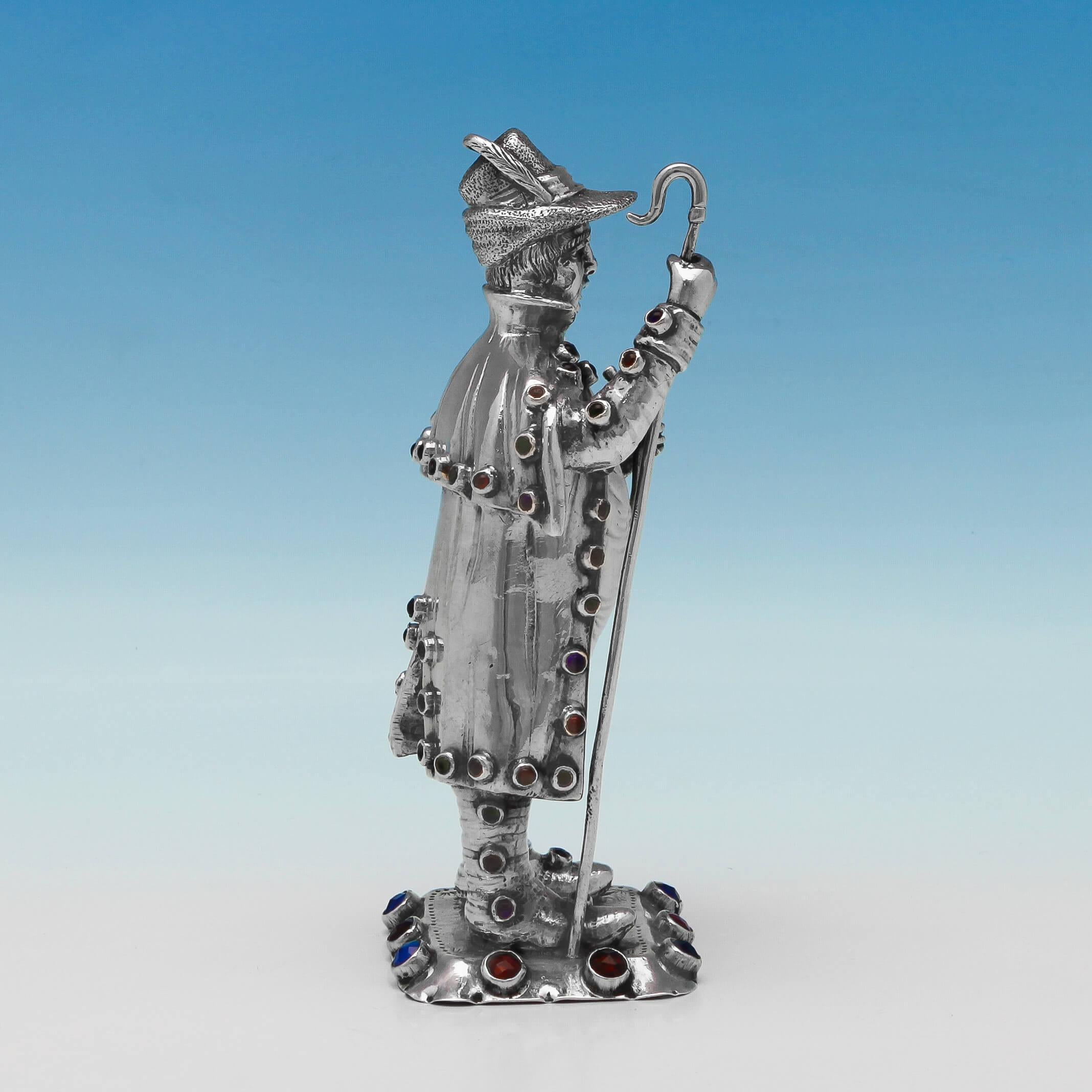 Carrying import marks for London, 1902 by Edwin Thompson Bryant, this handsome, antique silver model of a Gentleman, is wonderfully made with red and blue set paste to the Stand and clothes. The model measures 6.25 inches (16cm) tall, by 3 inches