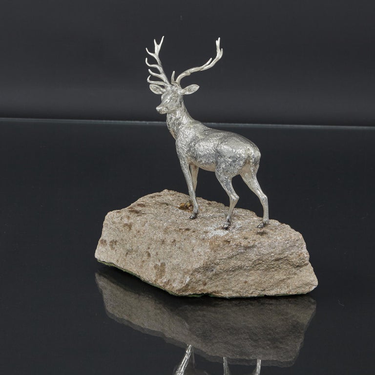 An Elizabeth II silver model of a twelve point royal stag by Edward Barnard realistically modelled and cast in sterling, and mounted on a stone base. The silver model itself is 120mm tall.

Stags are classified by the number of points or tines on