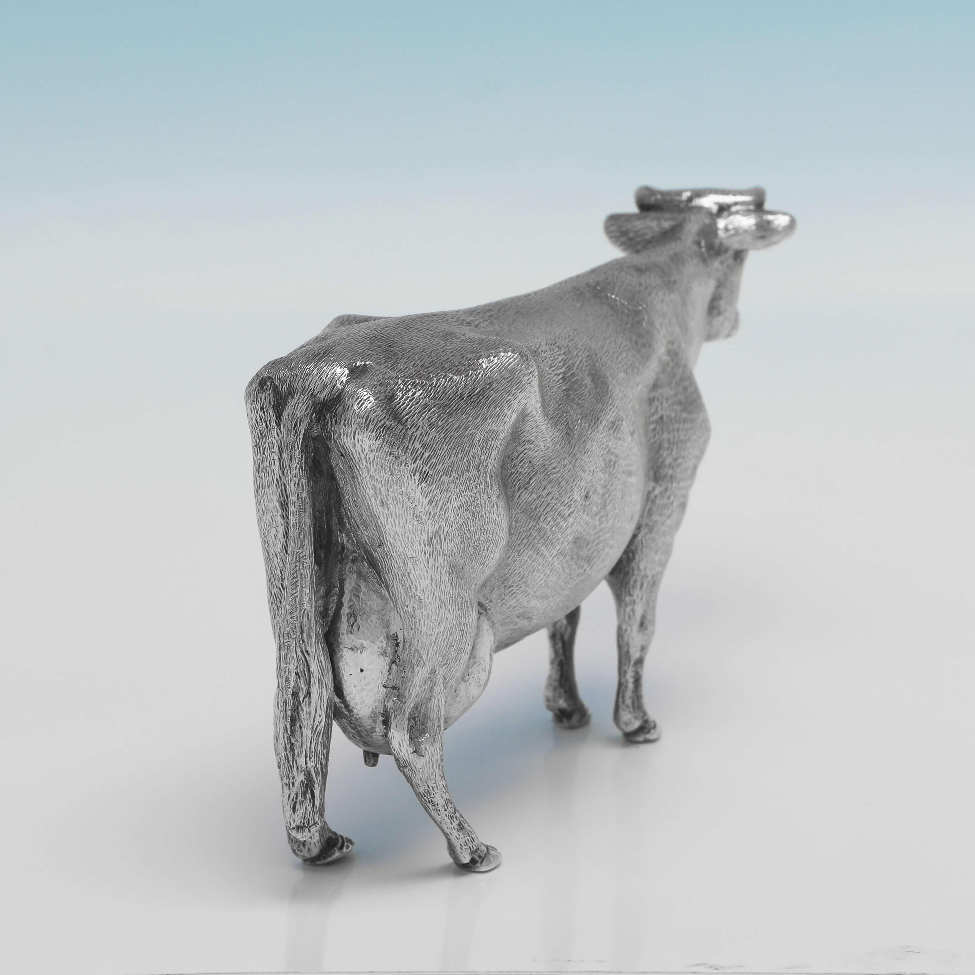 Hallmarked in London in 1973, this charming, Sterling Silver Model of a Cow, is realistically cast and hand finished. 

The cow measures 2.75