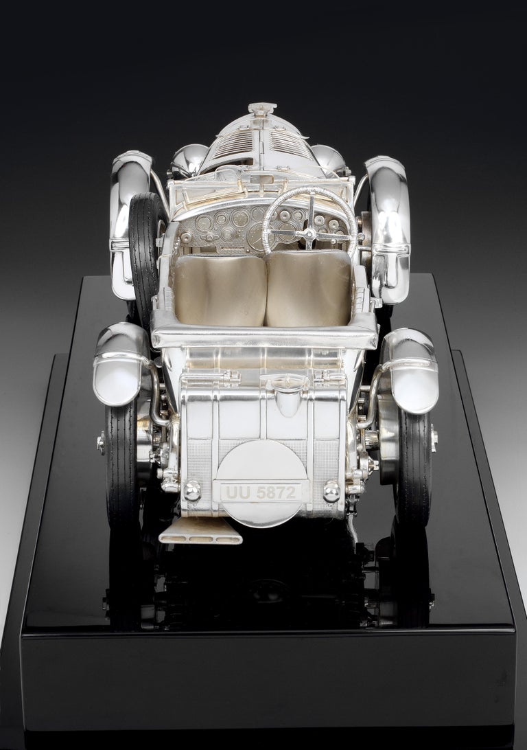 An extraordinarily detailed and immaculately recreated Sterling silver 1:12 scale model of Bentley’s 1929 supercharged 4½ litre ‘Blower’ by British silversmith Gil Holt of Anthony Holt & Sons. Only four ‘Team Blowers’ were built for racing, and this