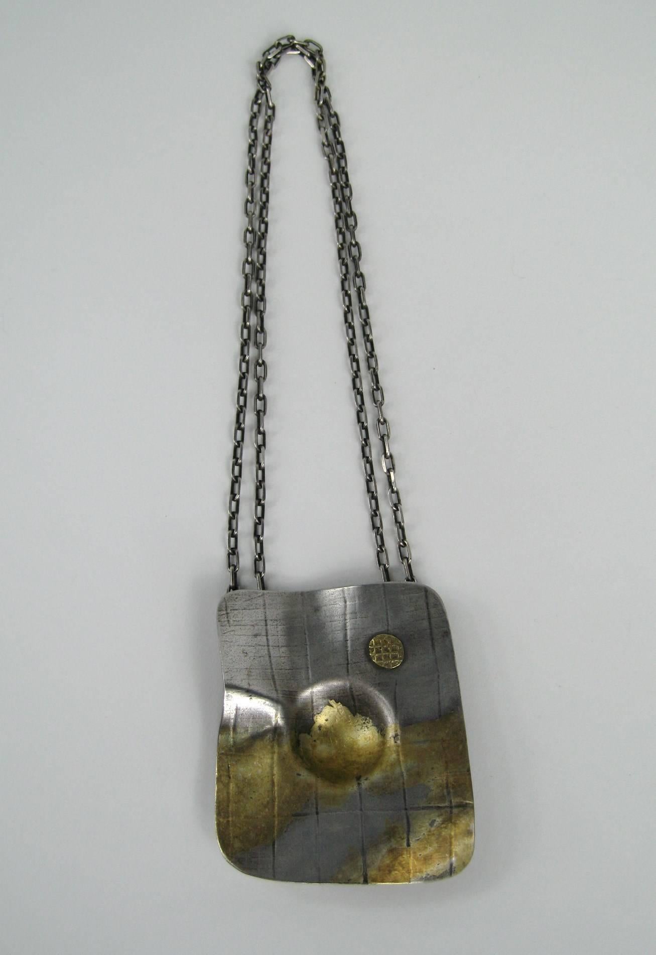Stunning workmanship on this handcrafted Sterling Silver Necklace. Gold wash over the silver. Measuring 26