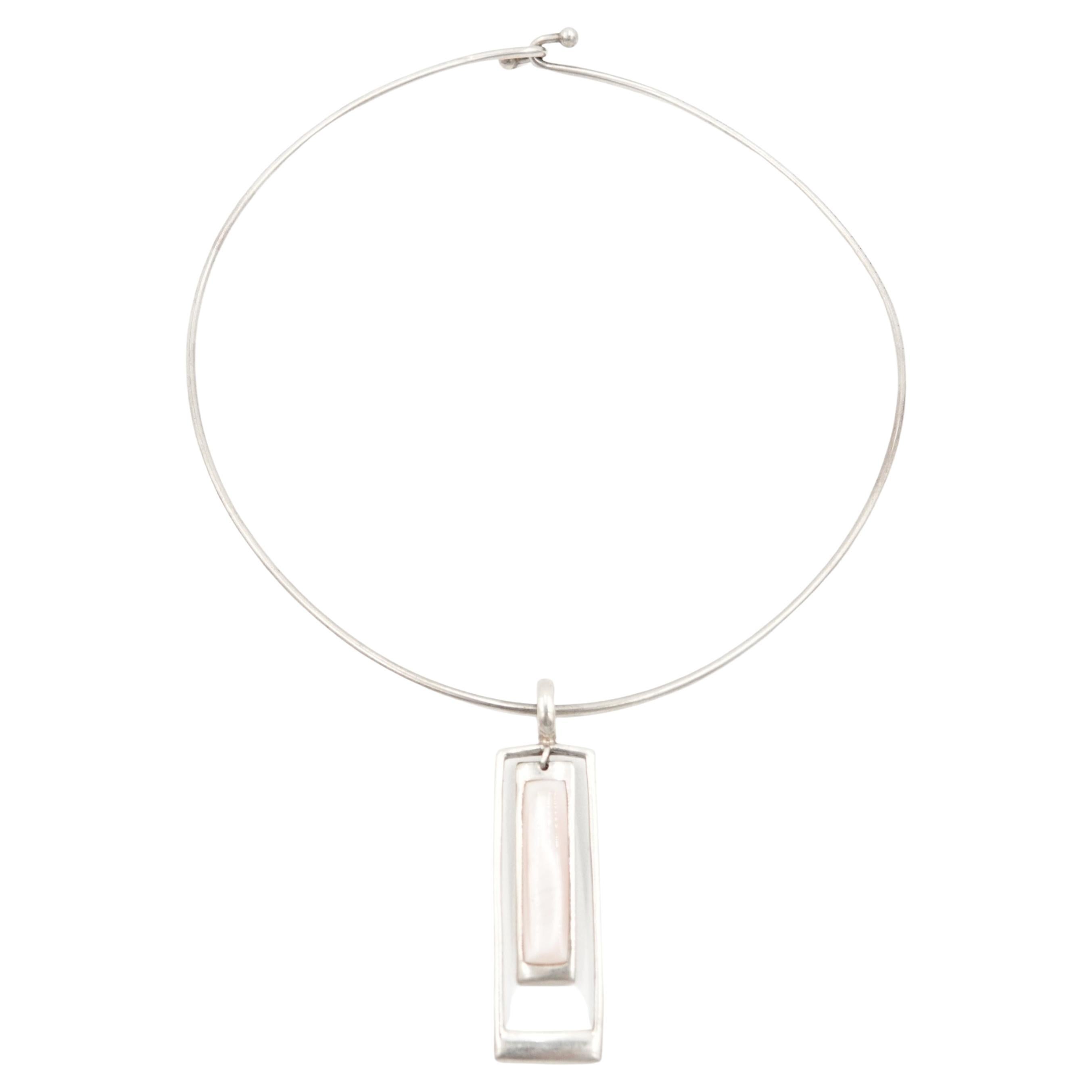 A.I.C. en argent avec pendentif géométrique, c. 1990