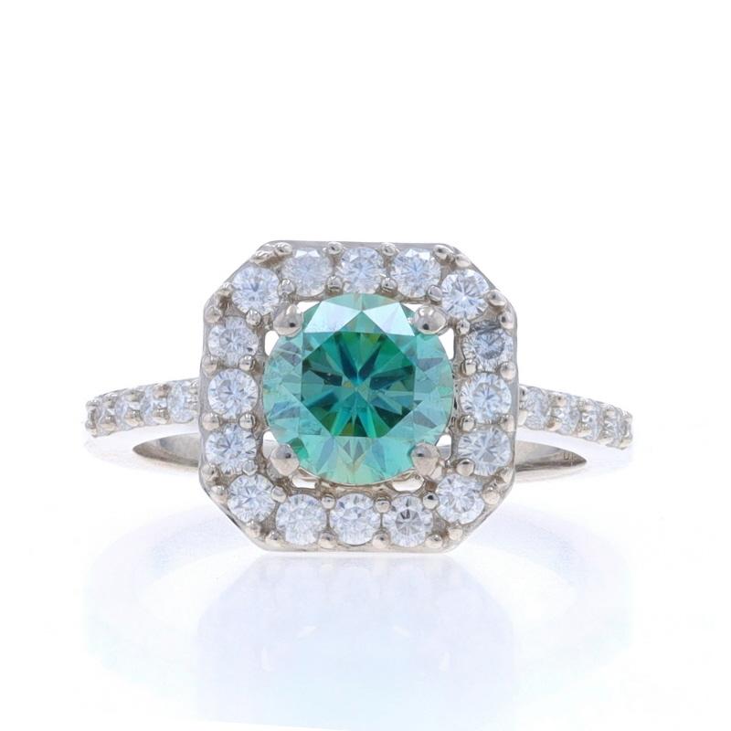Size: 6 1/4
Sizing Fee: Up 2 1/2 sizes for $20 or Down 1 1/2 sizes for $20

Metal Content: Sterling Silver

Stone Information

Moissanites
Cut: Round Brilliant
Color: Greenish Blue & Clear

Style: Solitaire with Accents Halo

Measurements

Face