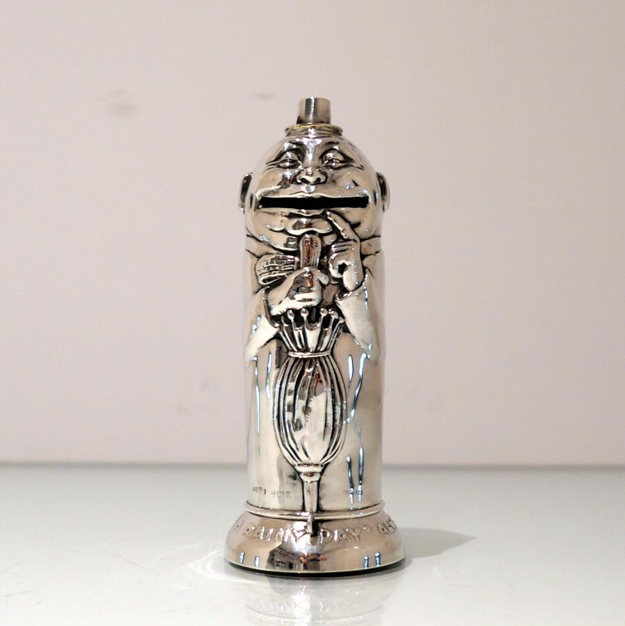 A splendid early 20th century sterling silver ‘Humpty Dumpty’ themed money box designed with a delightful bayonet fitting base around which sits a raised motto ‘BE PREPARED FOR A RAINY DAY’ for lowlights.

 Weight:  5.3 troy ounces/165